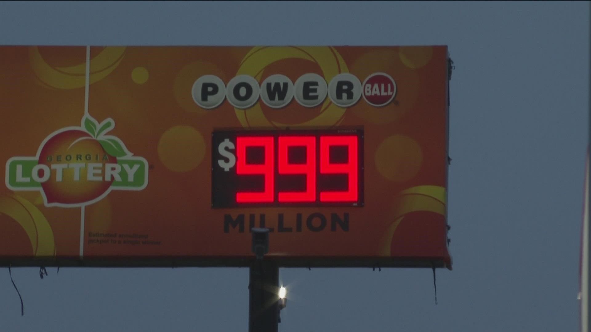 Powerball's grand prize surged to the milestone overnight after no one won the jackpot in Saturday's drawing.