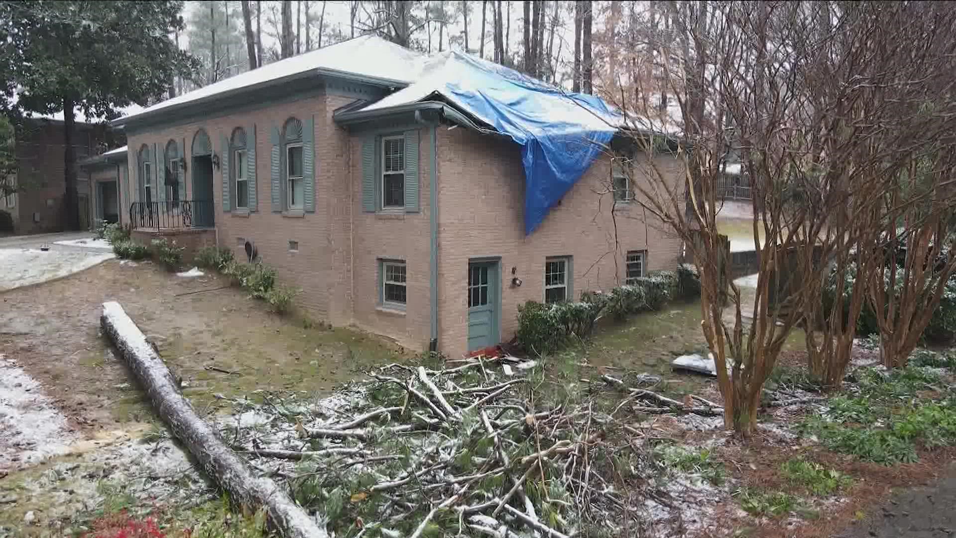 The tree toppled right on top of the homeowner's bedroom.