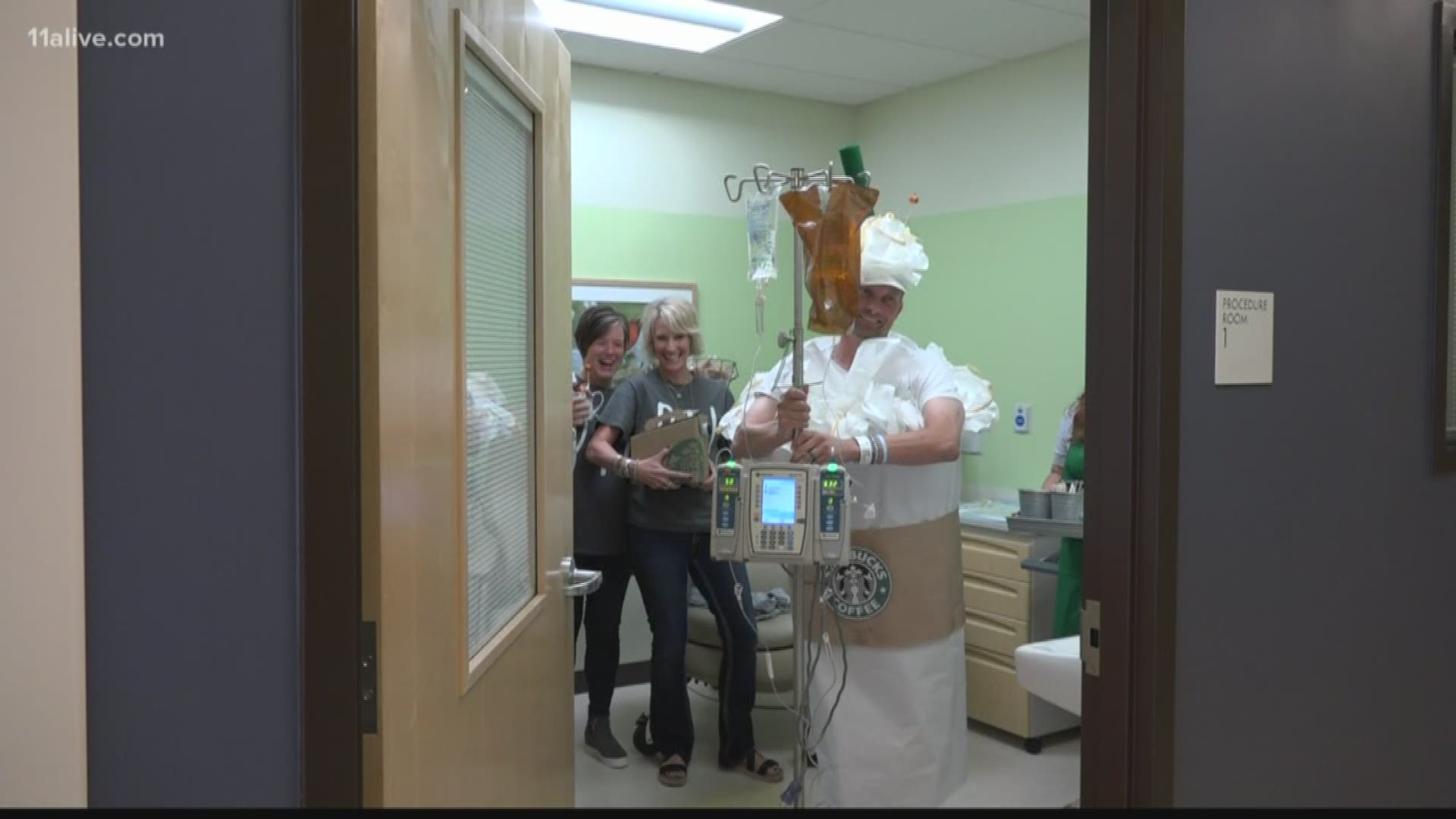 Decked out as a giant latte and toting his chemo pole behind him, he works the room.