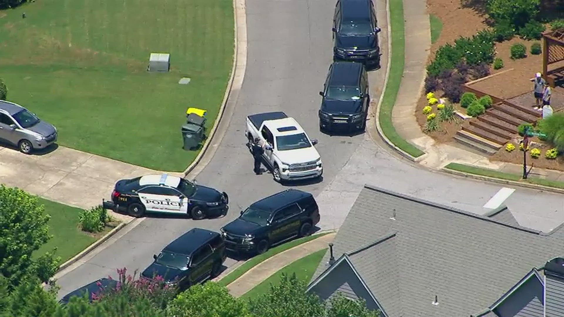 Officers are working to coerce a suspect out of a home in Kennesaw Monday afternoon.