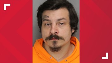 Murder suspect in fire at home where two died had violent history at same home, warrants allege