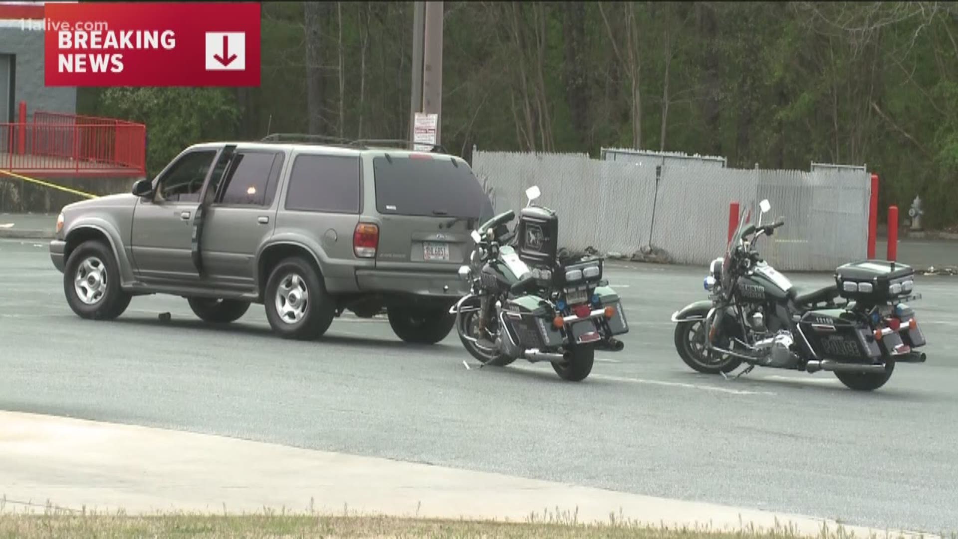 Authorities say a routine traffic stop carried out by motorcycle police ended with a suspect in critical condition on Wednesday - after he allegedly pulled a gun on them.