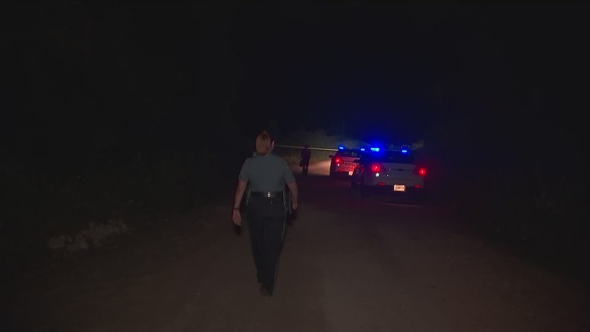 When officers arrived, they said a man was found dead on a dirt road.