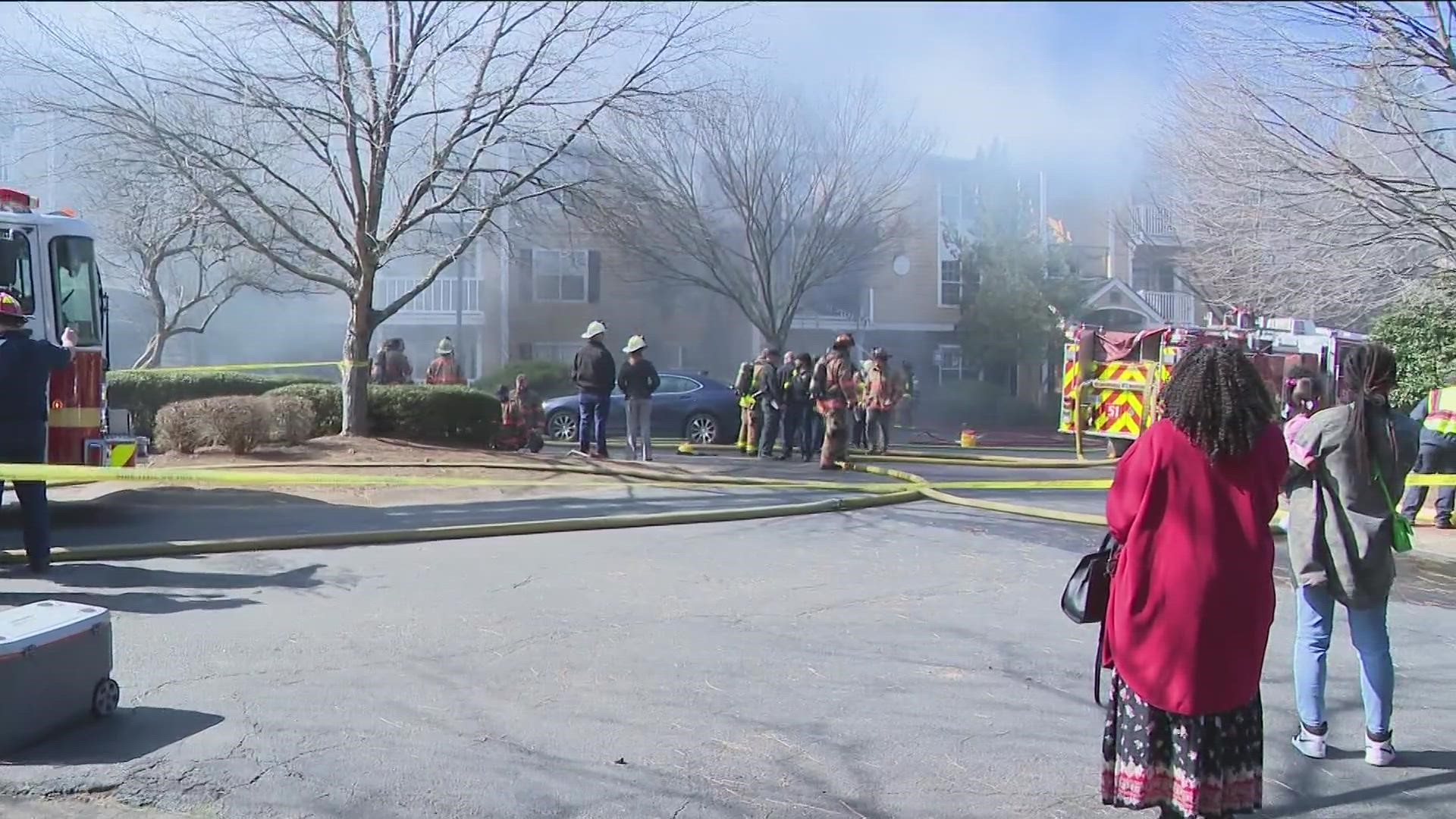 Police and fire personnel from both Marietta and Cobb County are putting out hot spots.