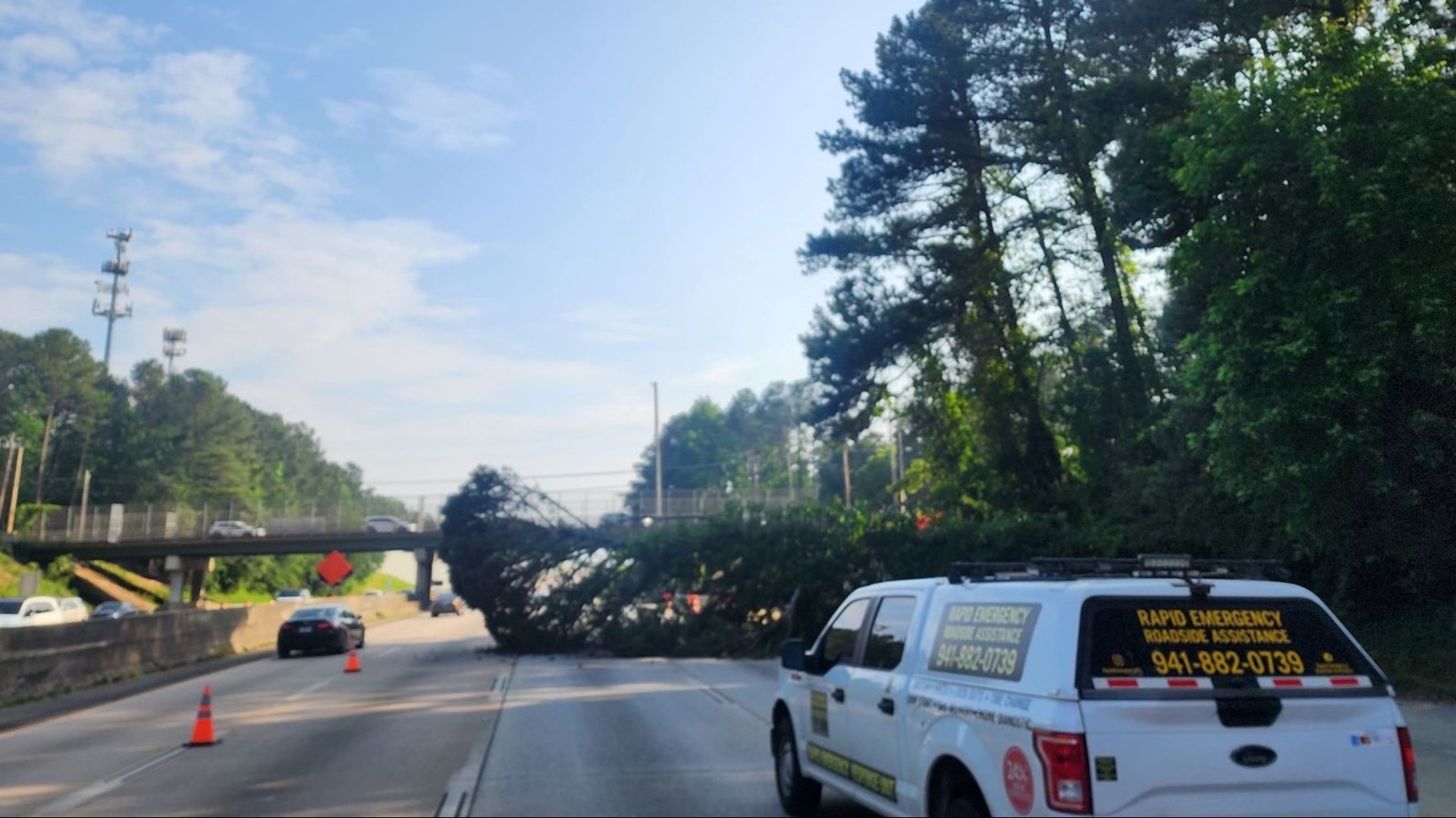 A tree is blocking several lanes on 400 southbound near Roberts Drive.
