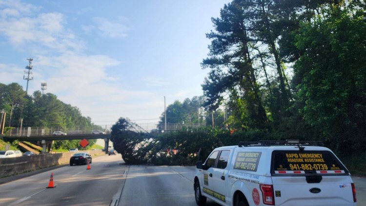 Large tree down on Georgia 400 causing massive traffic delays