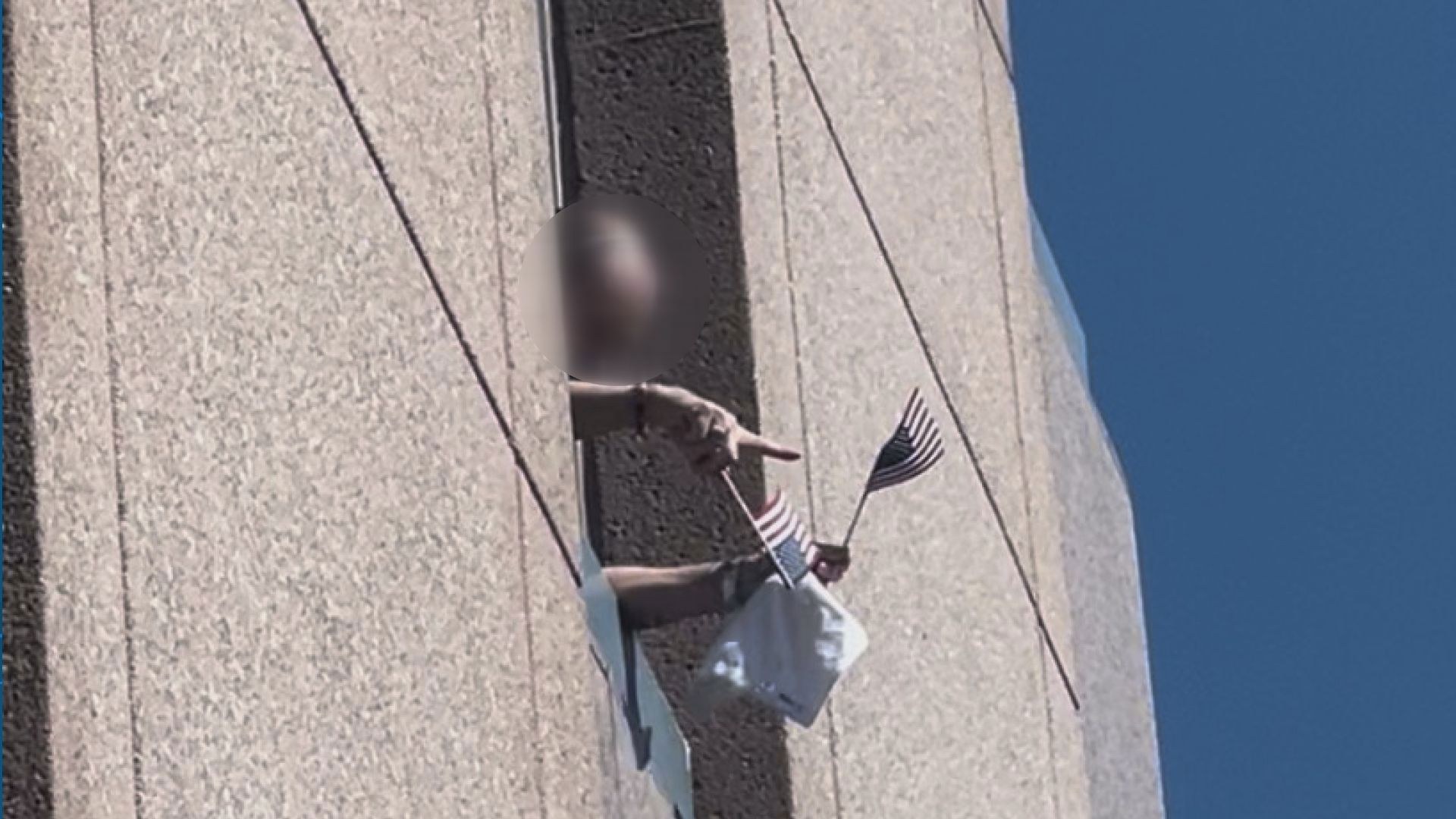 Videos submitted by 11Alive viewers show the suspect on the balcony before he was taken into custody.