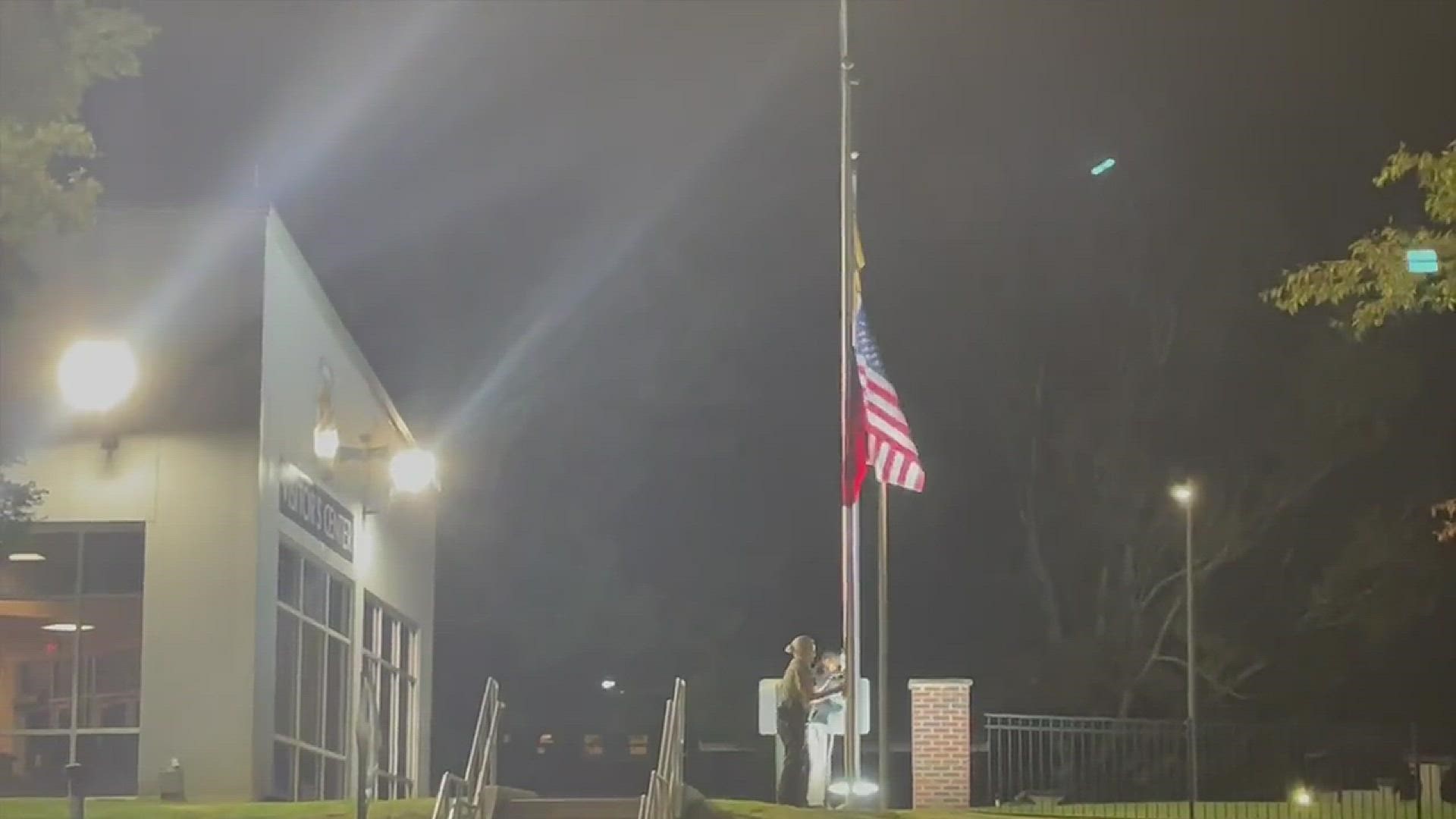 11Alive's Molly Oak captured the moment flags were lowered over the Cobb County Adult Detention Center after the deputies were killed. Two suspects were arrested.