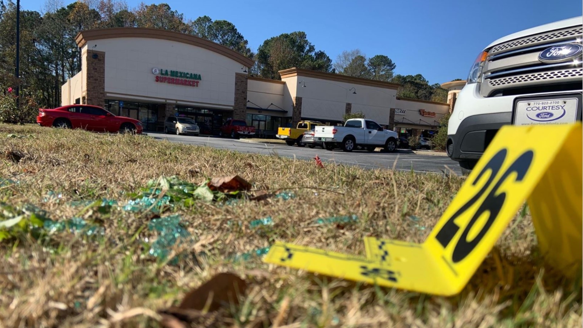 A teen boy is dead and a 17-year-old girl is in the hospital after a shooting outside a Gwinnett County supermarket Wednesday night, police said.