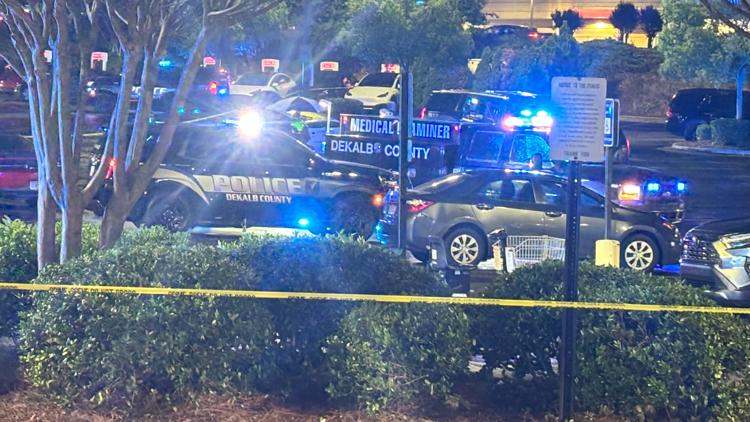 Woman killed, man charged with murder in shooting in parking lot of ...