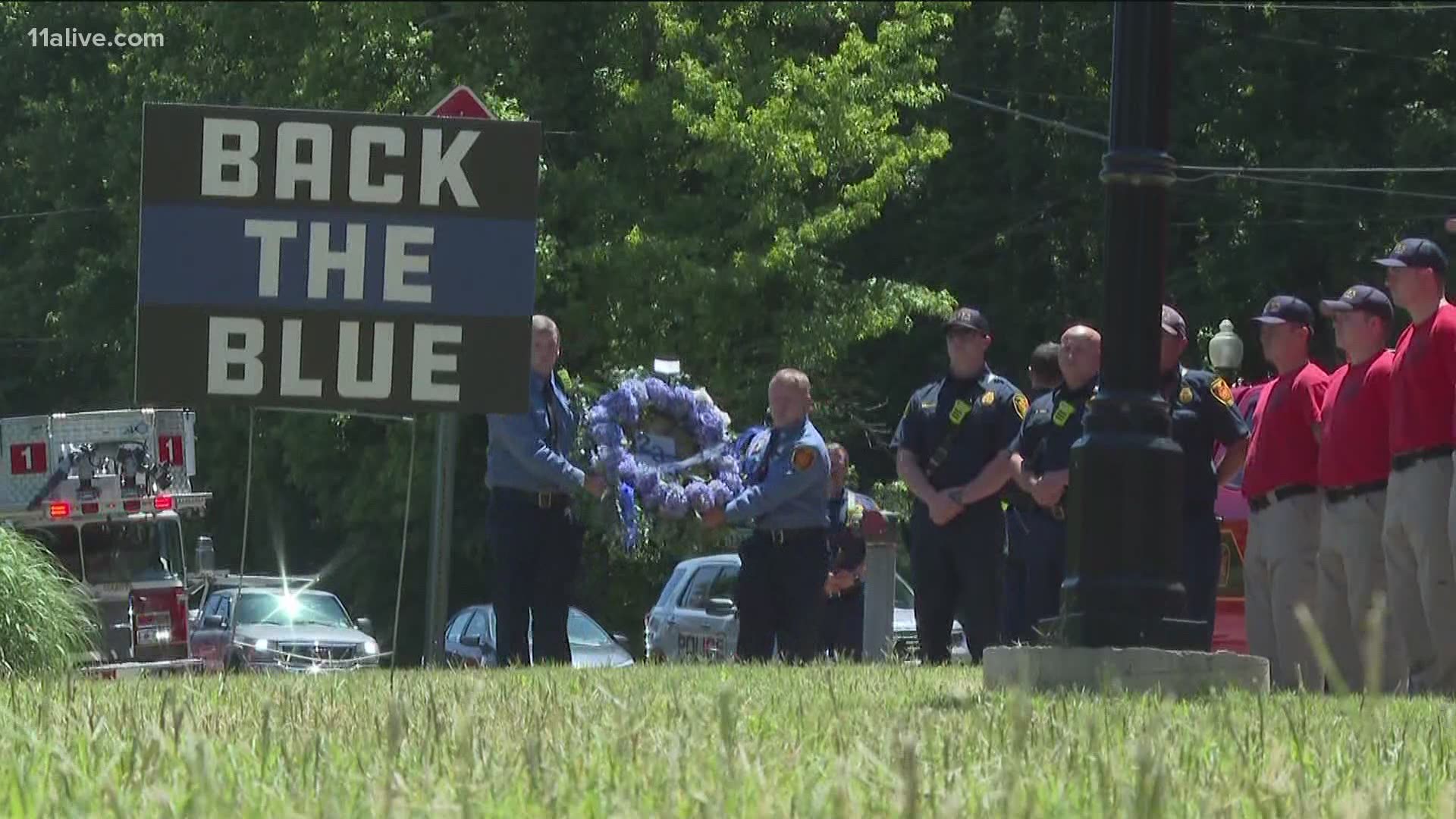 Community pays tribute to Holly Springs officer killed in line of duty