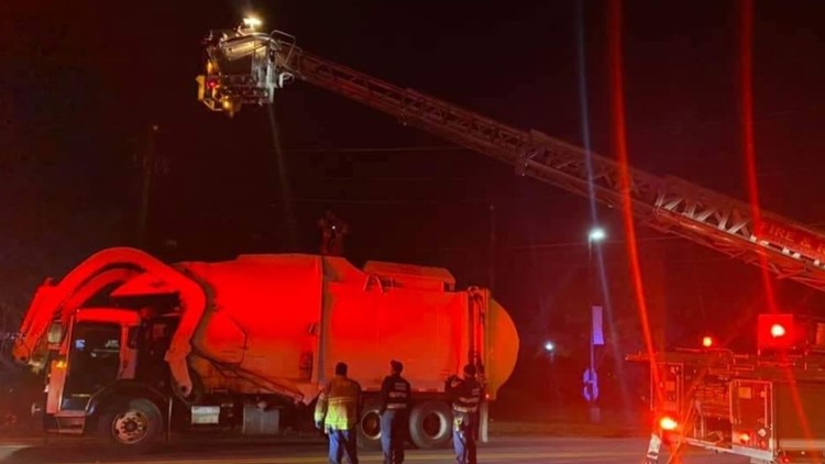 Man rescued out of garbage truck in Dunwoody