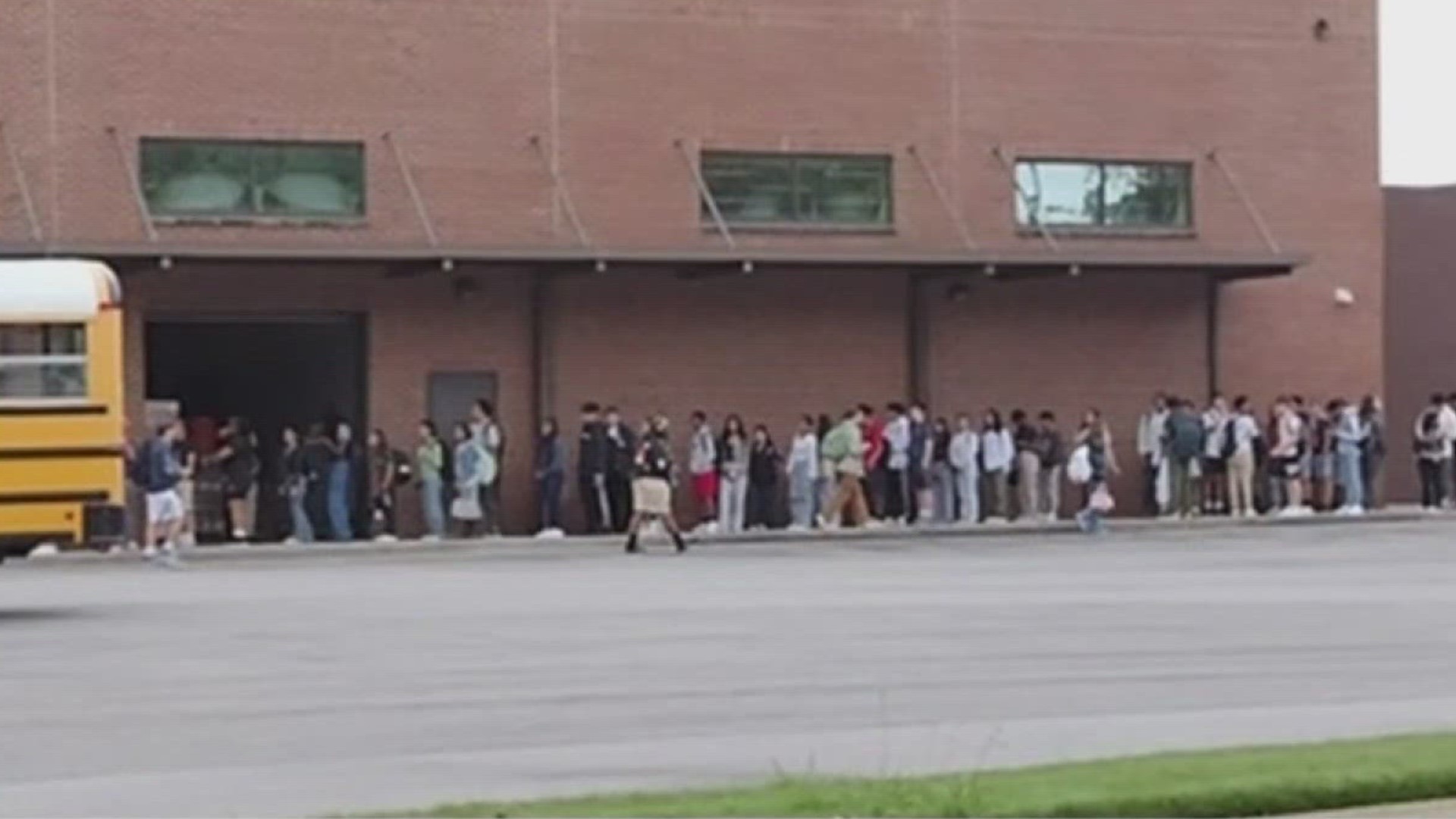 Video from a viewer showed lines stretching outside of Chamblee Middle School on Tuesday.