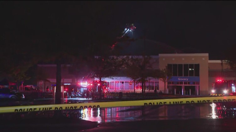 Peachtree City Walmart fire | Firefighters work to douse flames