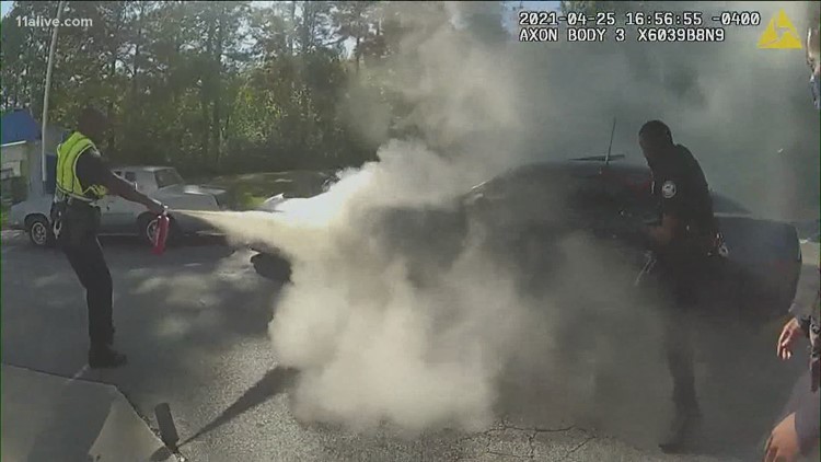 Driver having seizure rescued from burning car by Atlanta officers
