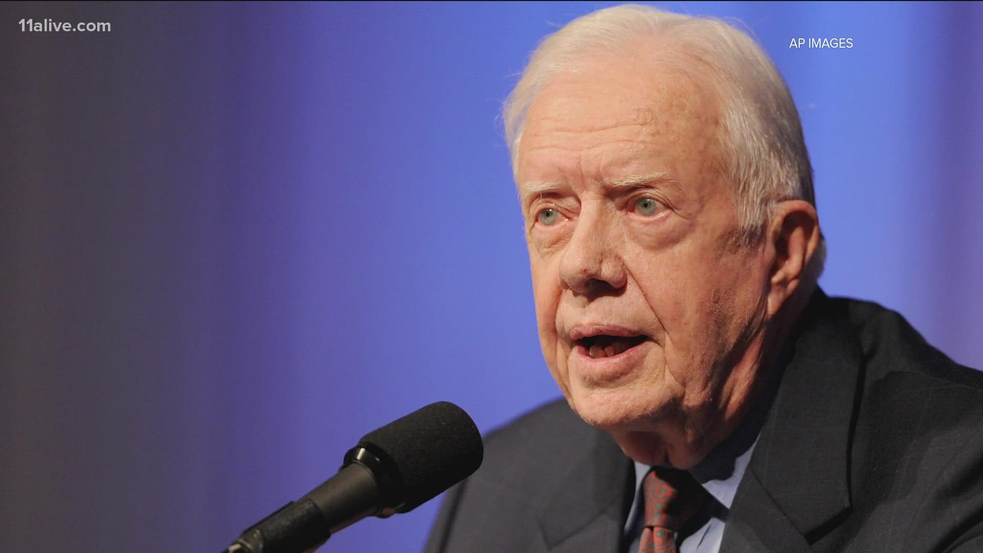 "Our great nation now teeters on the brink of a widening abyss," Carter wrote.