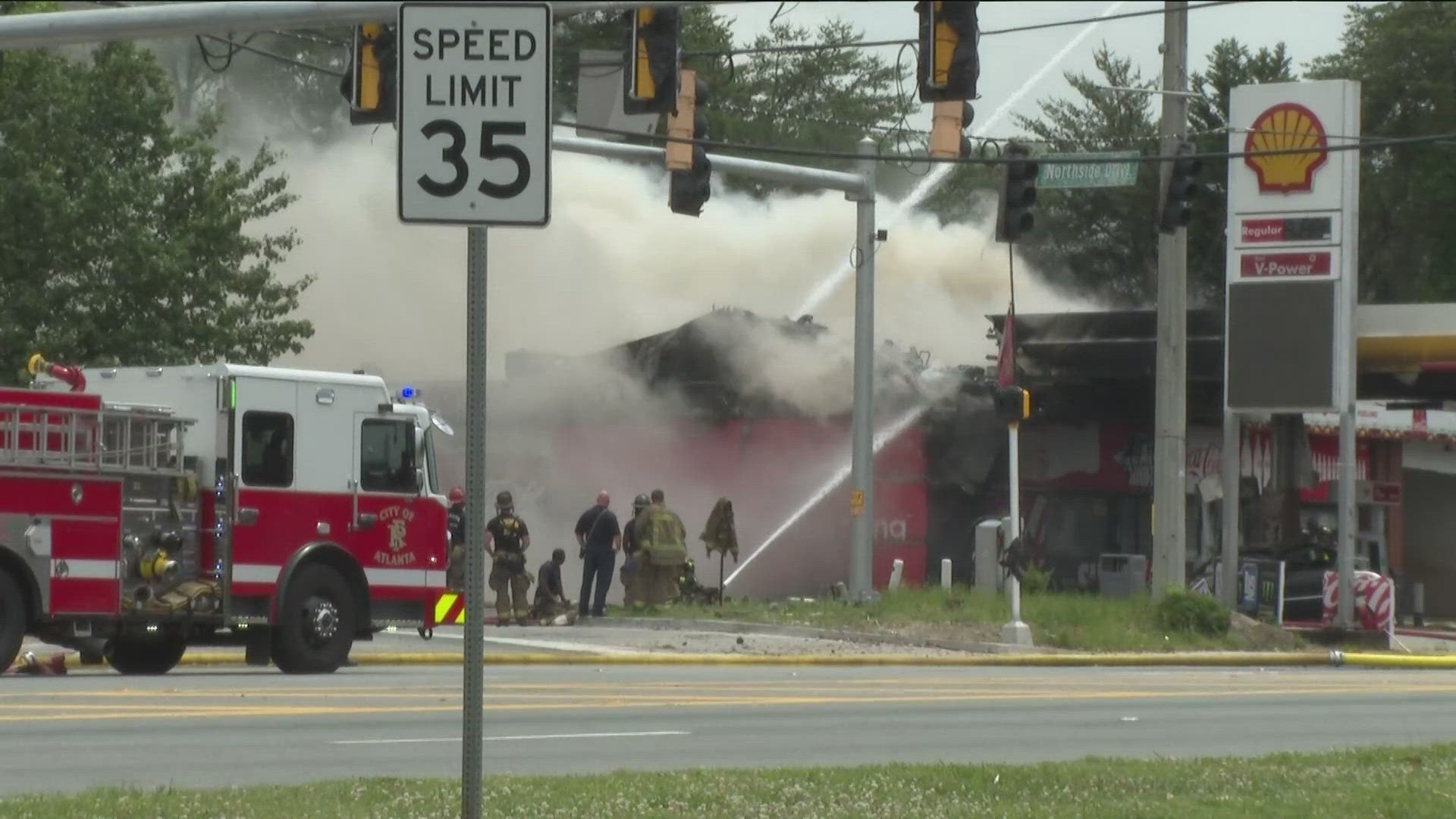 11Alive SkyTracker flew over a Shell gas station along Northside Drive, where heavy smoke was seen as firefighters worked to extinguish the flames.