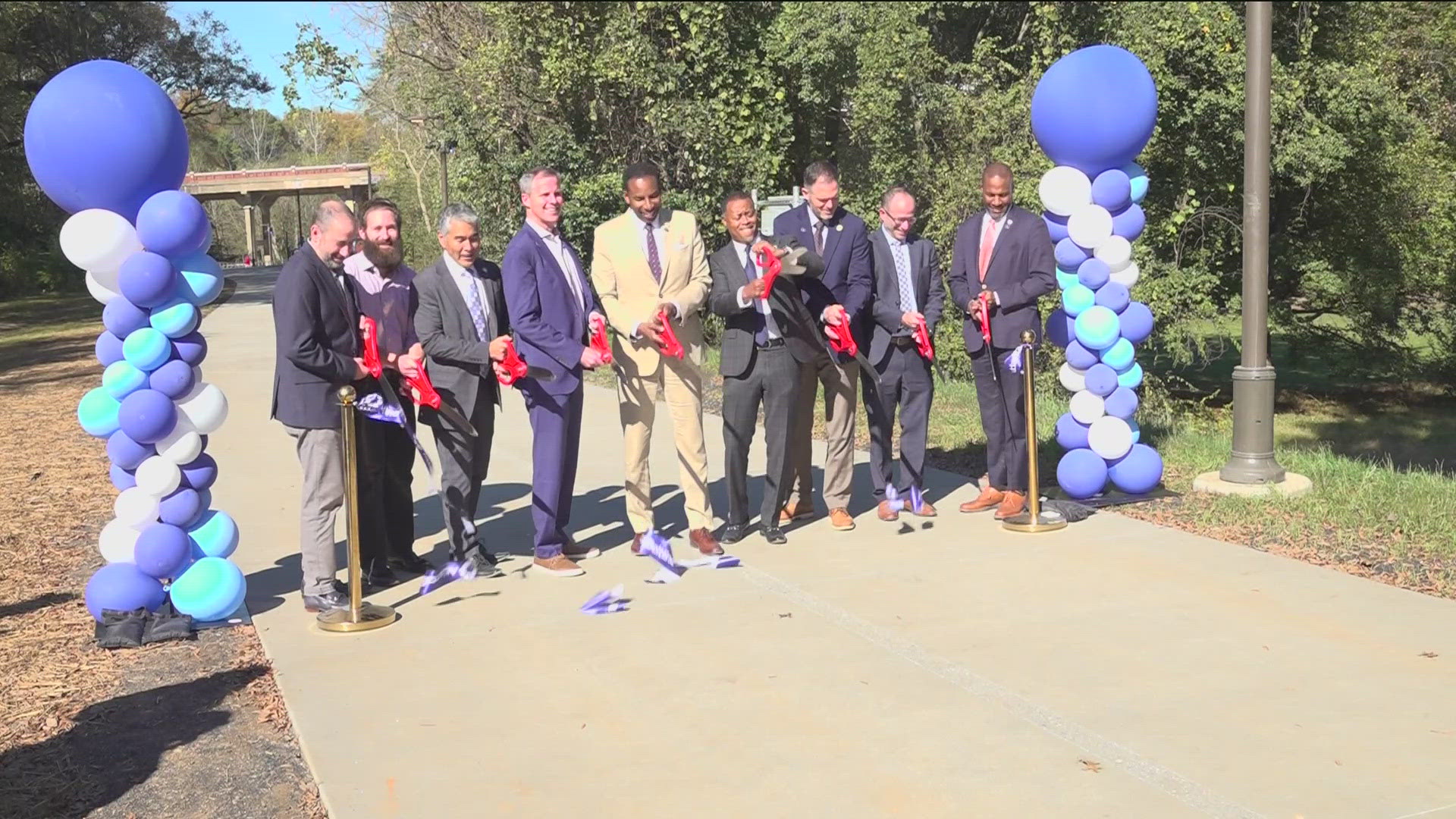 Tuesday's ribbon cutting brings the trail one step closer to completion. 