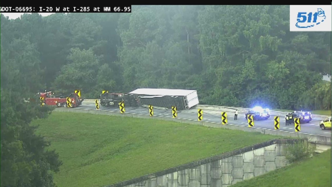 Overturned tractor trailer blocking ramp from I-285 SB to I-20 ...
