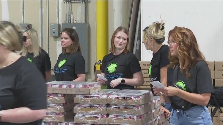 Volunteers pack meals for hungry kids in Fulton County