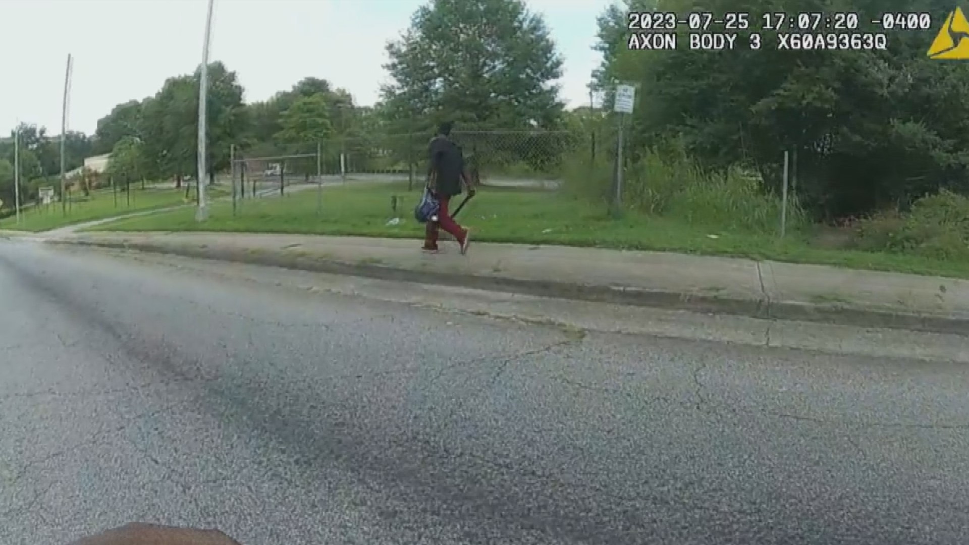 The bodycam video shows the APD officer responding to a burglary call and then realizing the suspect is carrying a machete. A chase follows.