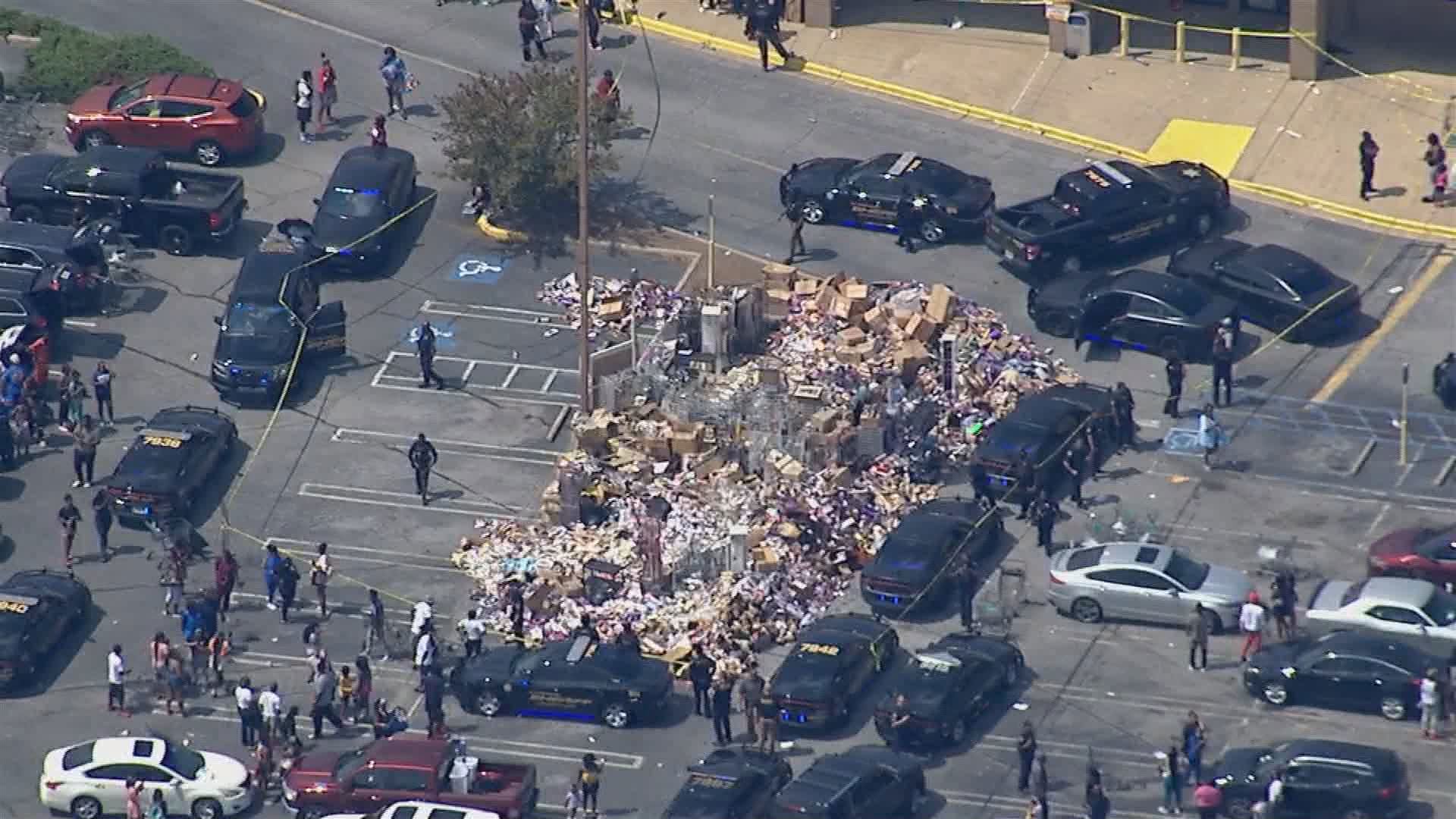 Deputies lined a perimeter around the dumped merchandise.