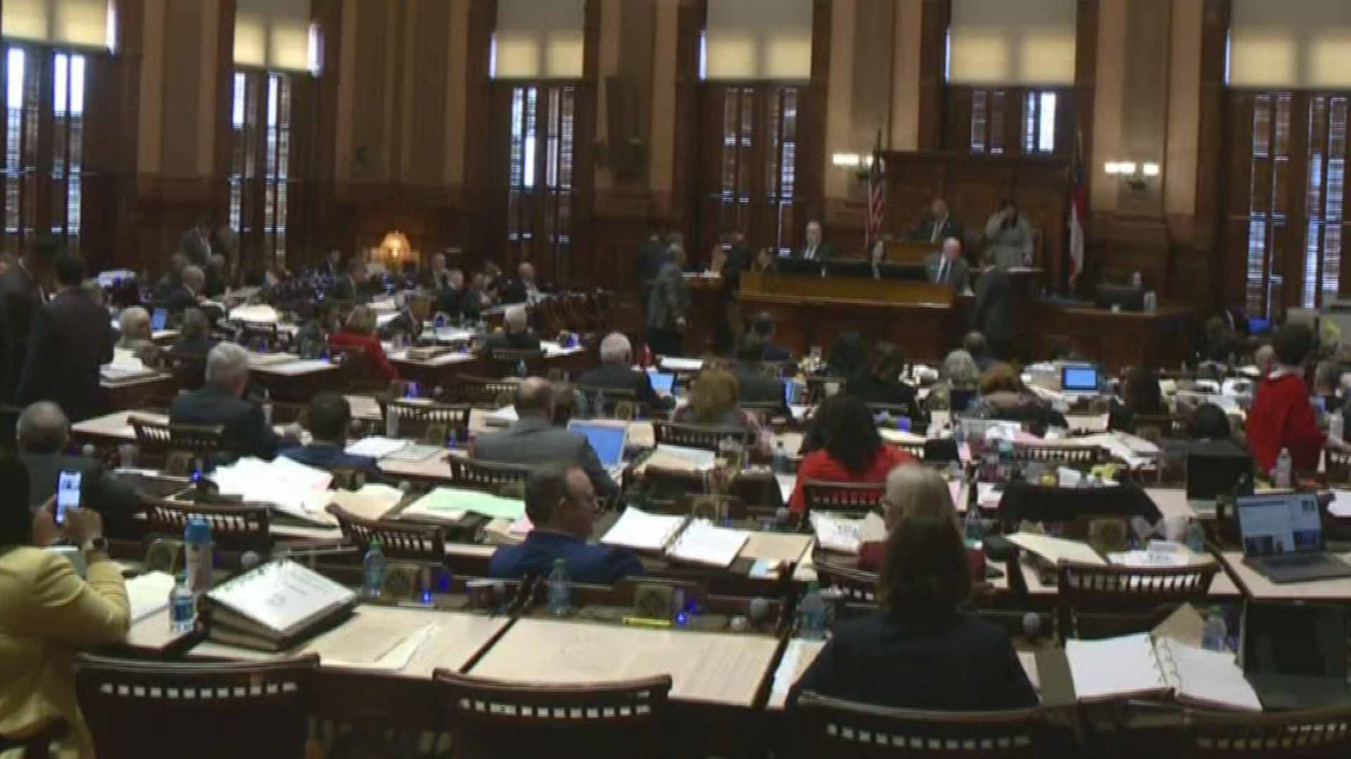 Georgia lawmakers are adapting their schedule due to the outbreak. They're suspending the legislative session starting next week, but plan to return later.