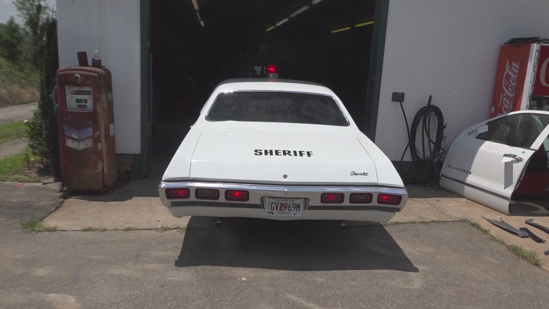 A local body shop is restoring a vintage car that will eventually be part of a memorial for officers killed in Forsyth County.
