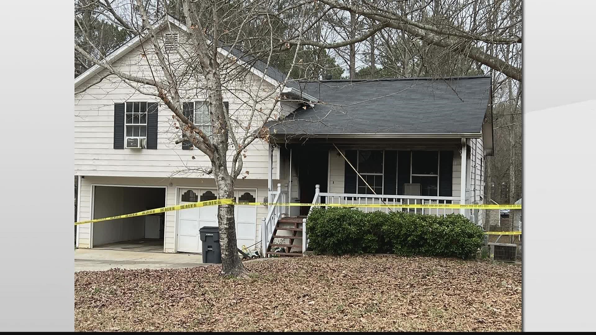 A 70-year-old woman was killed while her grandson was treated for smoke inhalation.