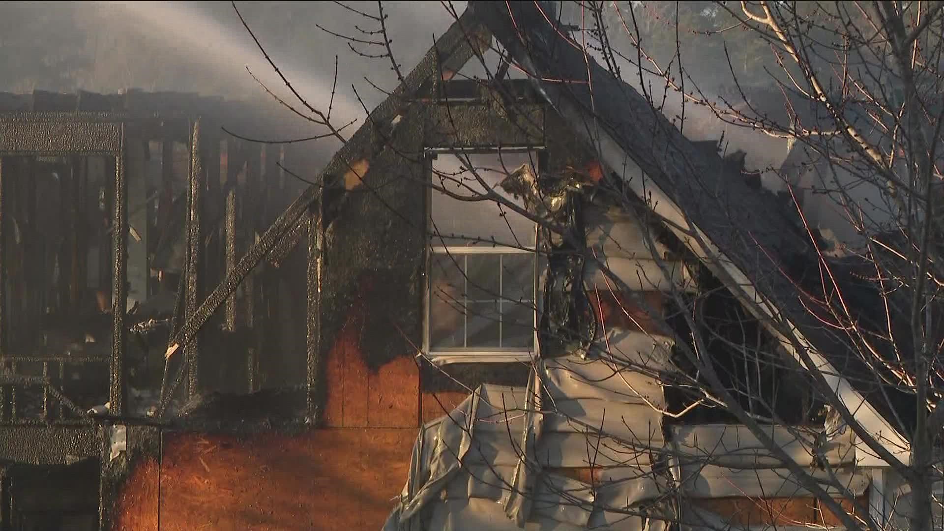 DeKalb County Fire Rescue responded to a two-story house fire in Lithonia on Sunday afternoon.