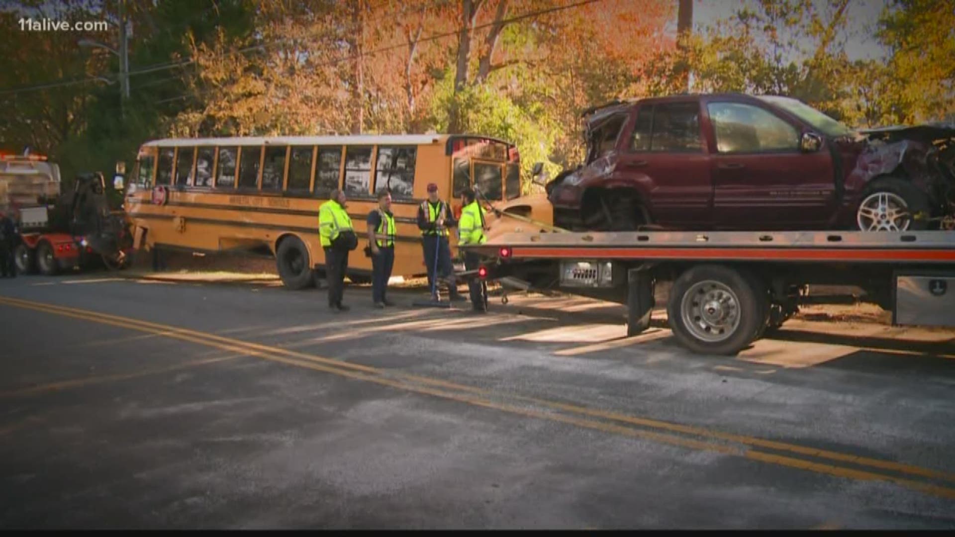 A 16-year-old lost control of his SUV and collided head-on into a school bus in Marietta, Thursday morning, police said.