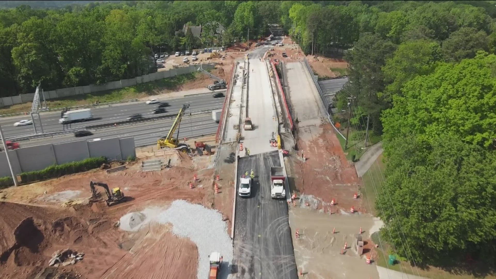 The new bridge won't be open to pedestrian traffic until work is complete on the sidewalks.