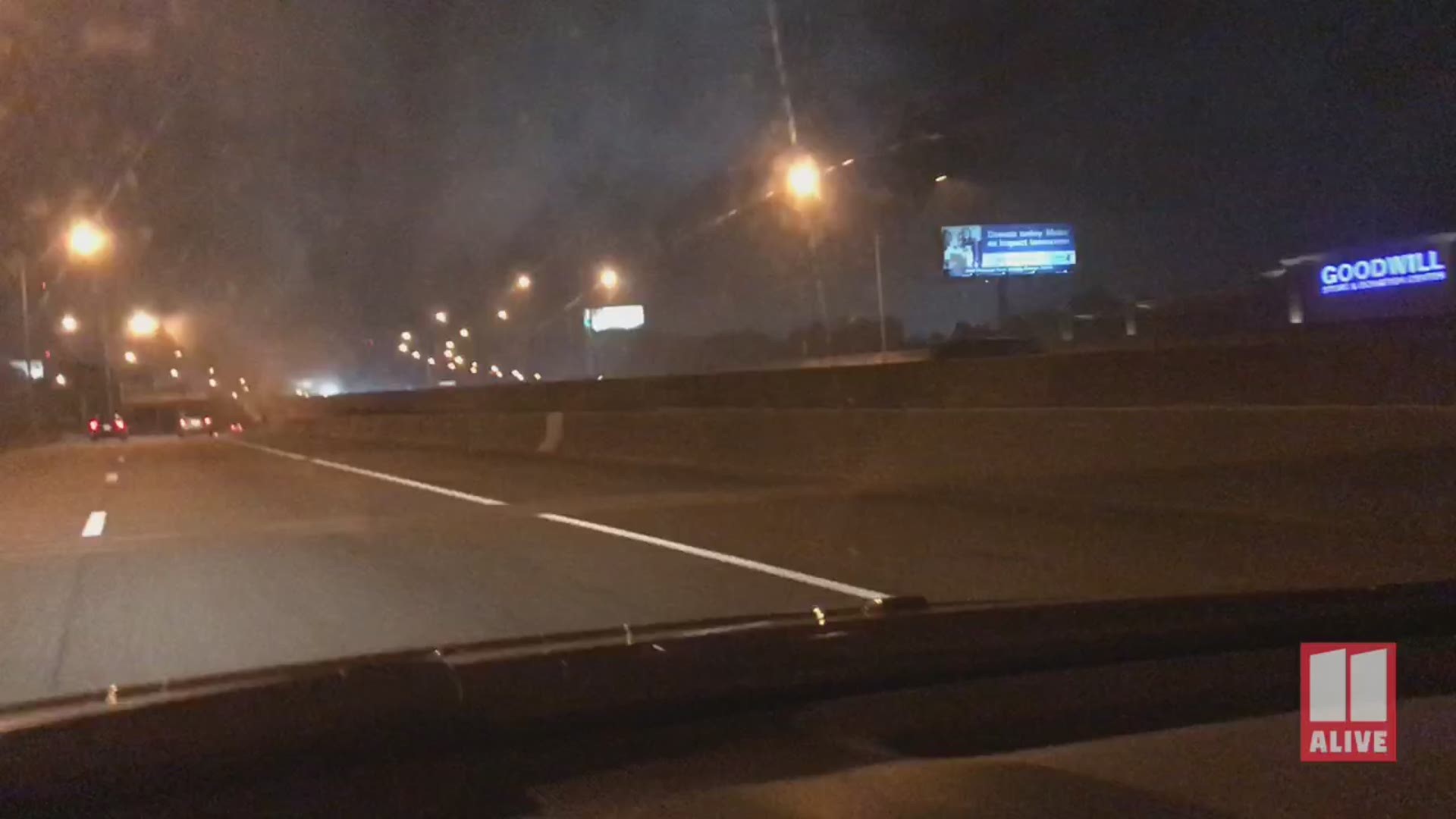Video shows a fire burning under I-85 in the midtown area on July 19, 2019