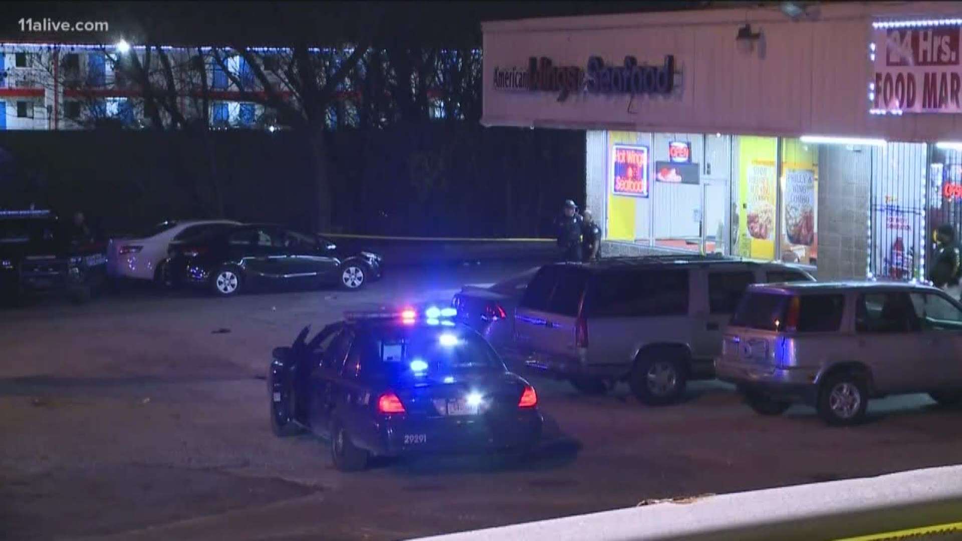 Police found the woman shot in the head outside a strip mall late Friday evening in Atlanta.
