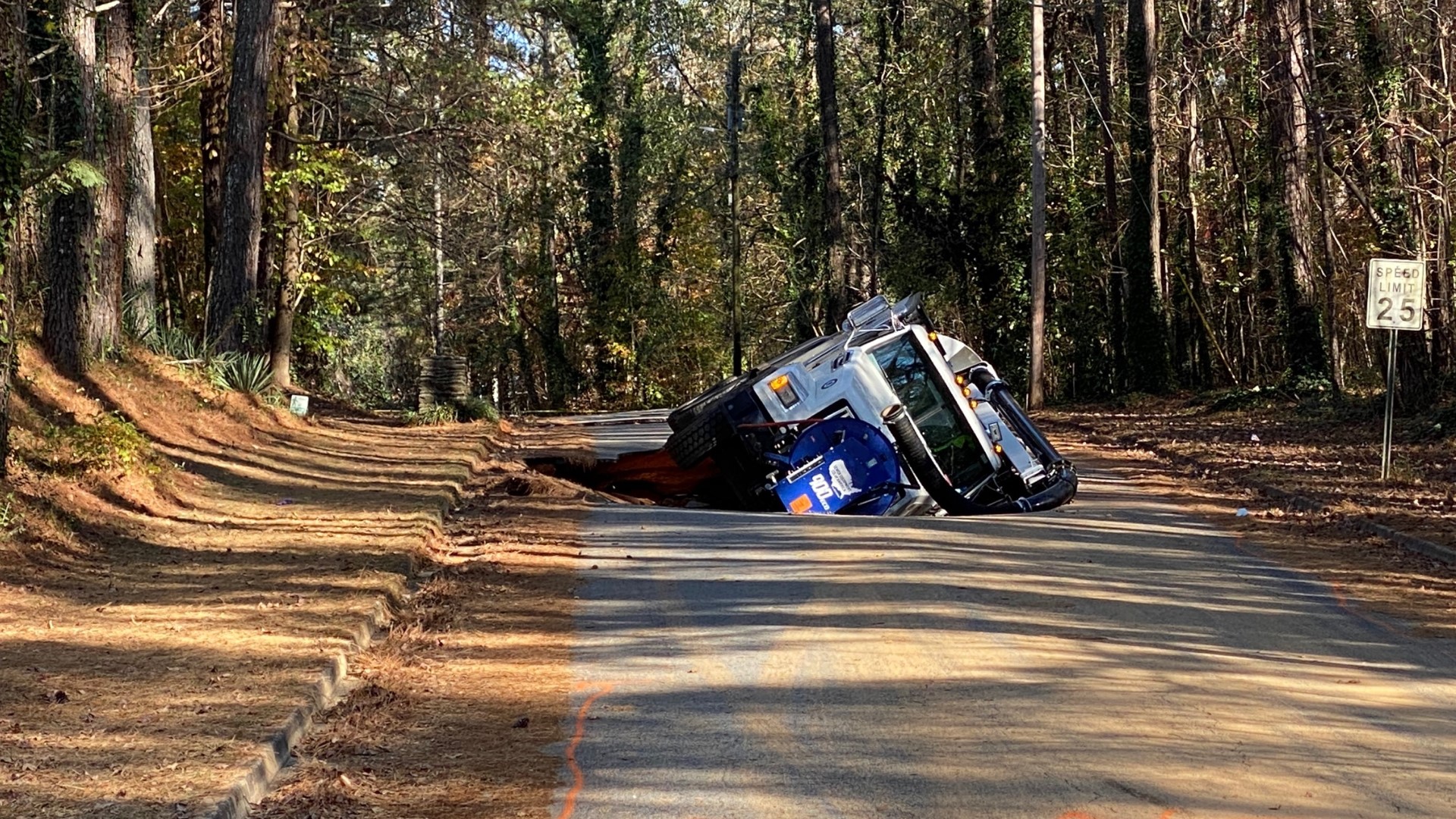 A water main break caused two large sink holes Thursday morning, essentially swallowing a large truck, City of South Fulton officials said.