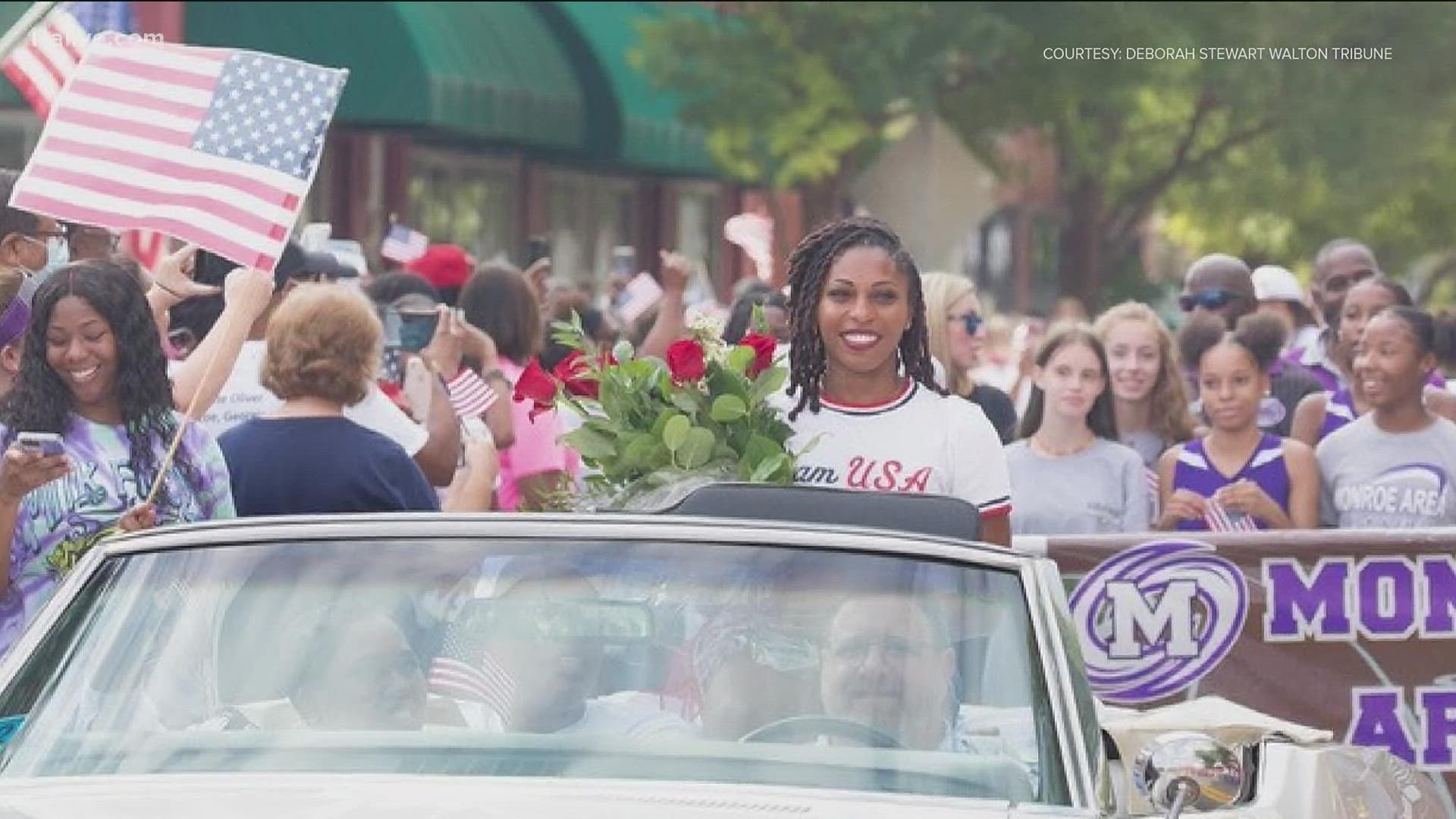 Neighbors, friends and city leaders came to Downtown Monroe for a parade to celebrate Javianne Oliver's success.