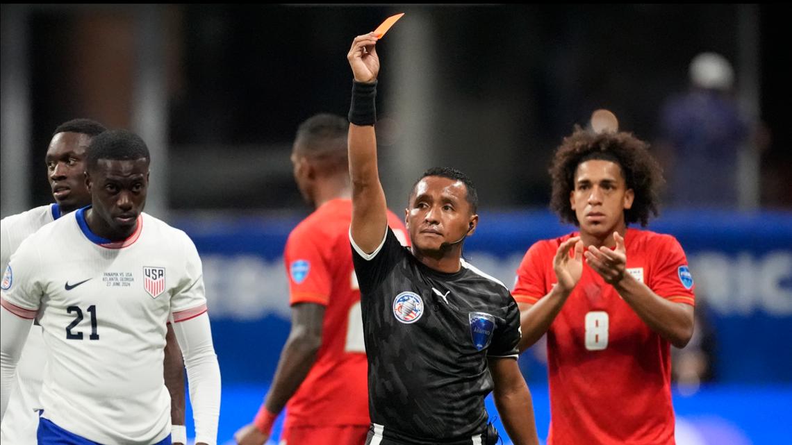 USA player gets red card early for apparently punching player | 11alive.com