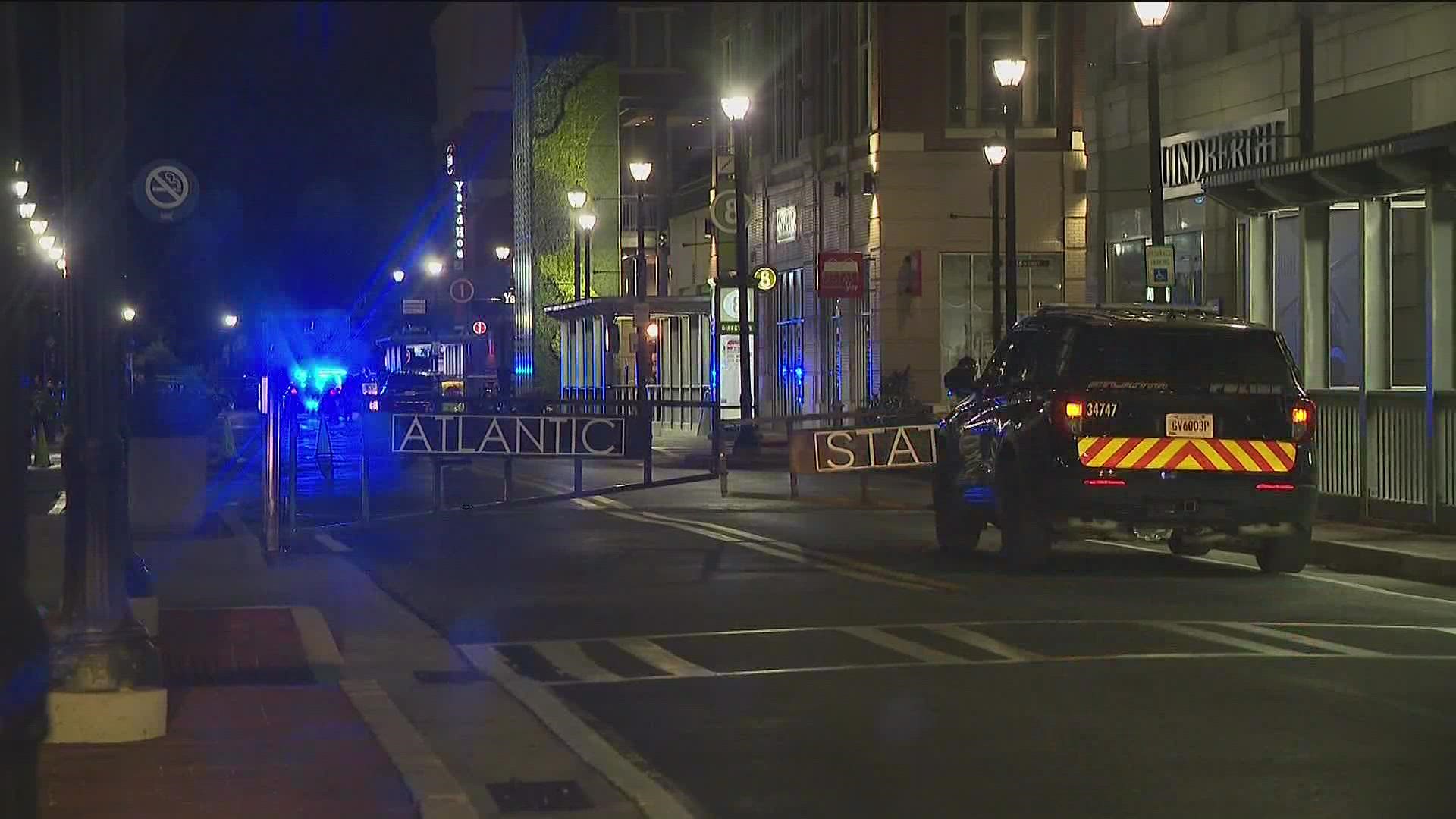 Police said it may have been a shootout between two groups who had originally been escorted off the Atlantic Station property by APD.