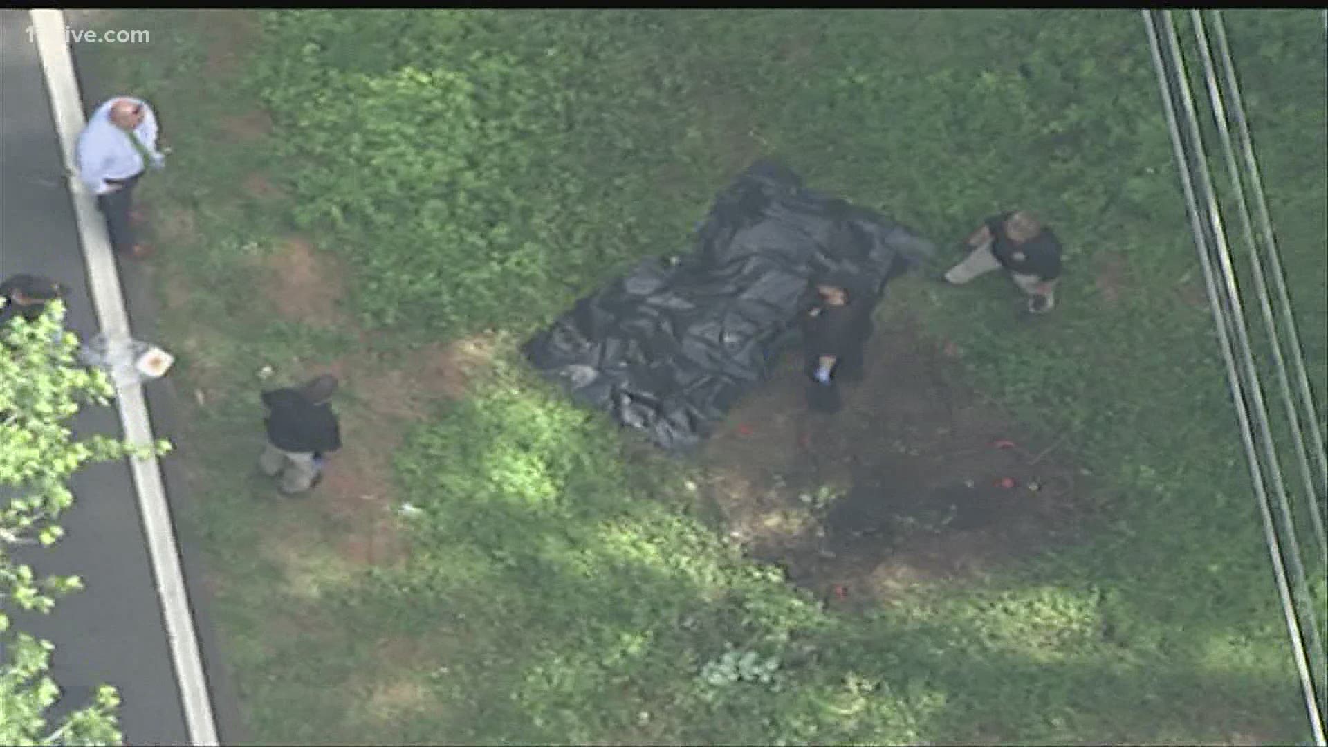 Officials said a worker had called police after discovering what he believed to be human remains in a grassy area.