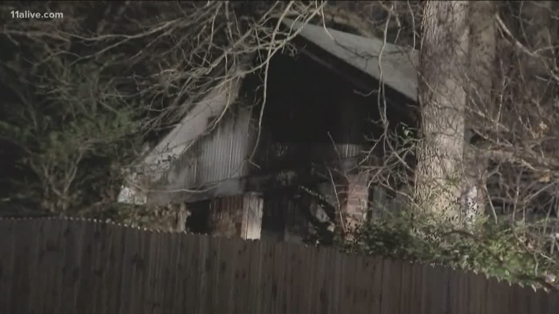 A house fire claimed the life of a woman in Powder Springs early Thursday morning.  Police say a woman died and a child was injured.