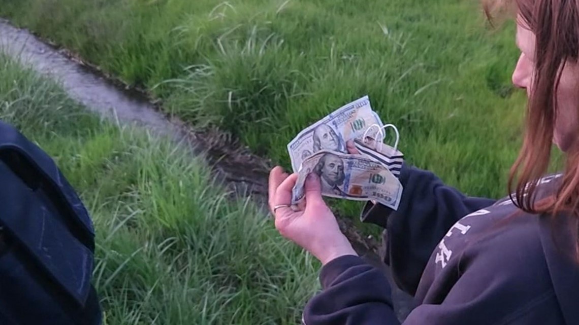 Oregon man drains his family's bank account, tosses 200,000 out of his