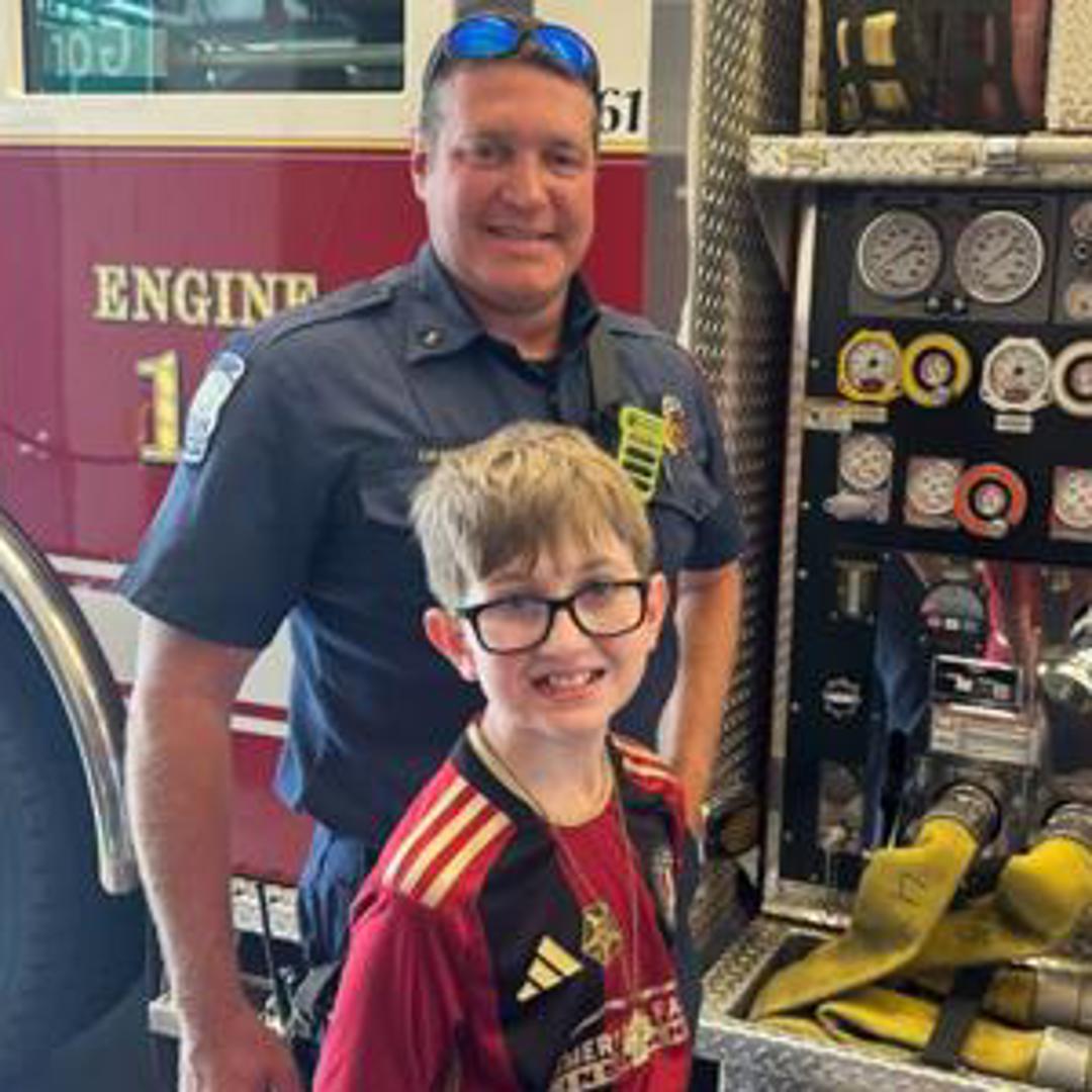 Cobb County firefighters reunite with 10-year-old boy rescued from car ...