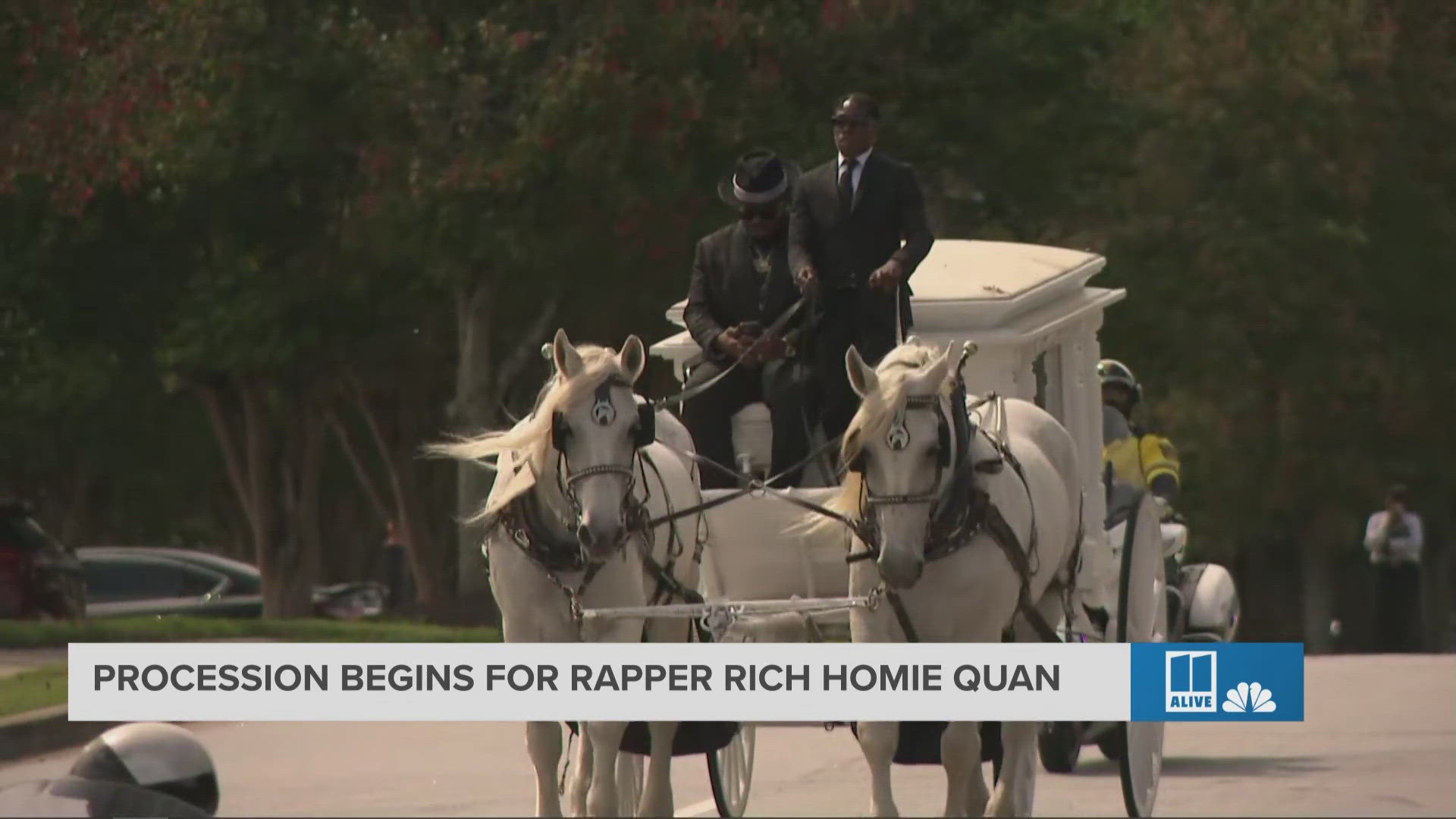 After a celebration of life, a procession was held for Rich Homie Quan. His casket was pulled away in a horse and buggy.