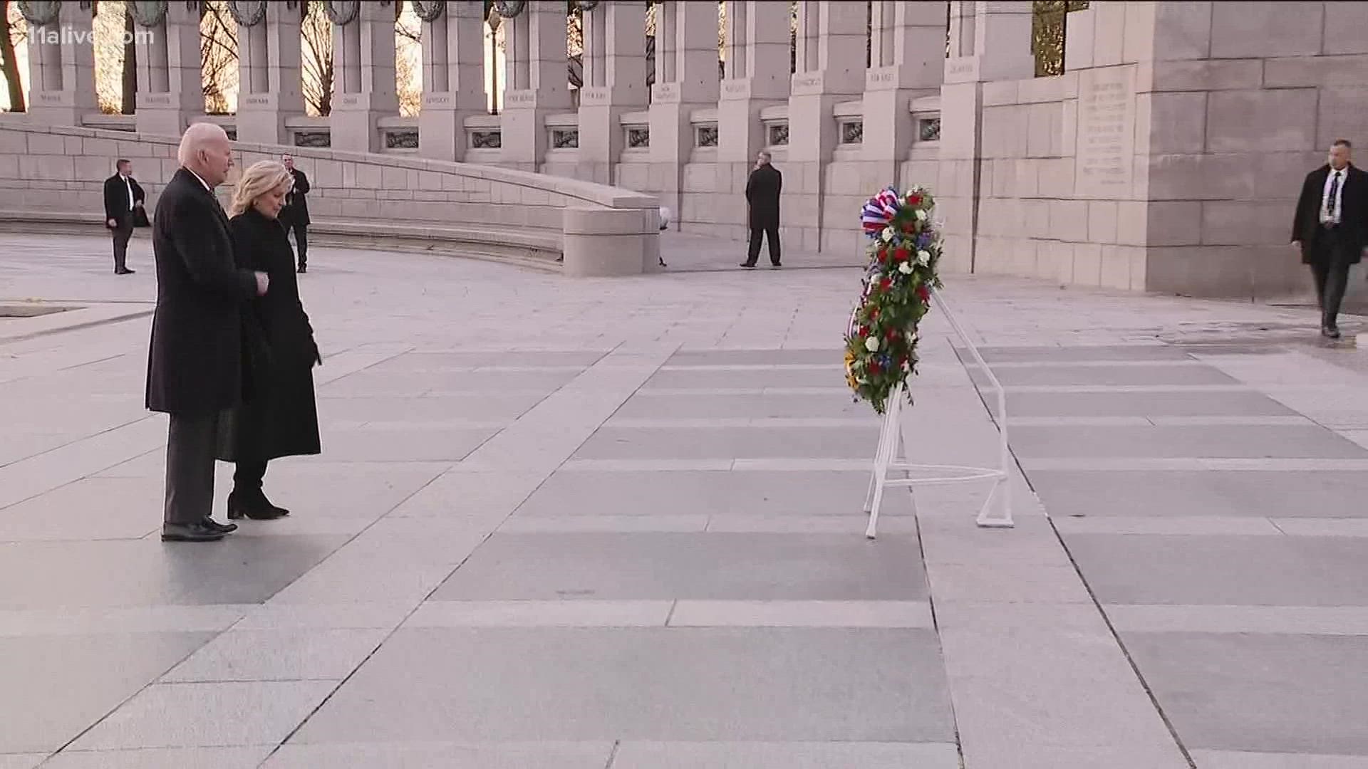 President Biden and the first lady visit WW2 memorial in the nation's capital to pay tribute to veterans on 80th anniversary of Pearl Harbor.