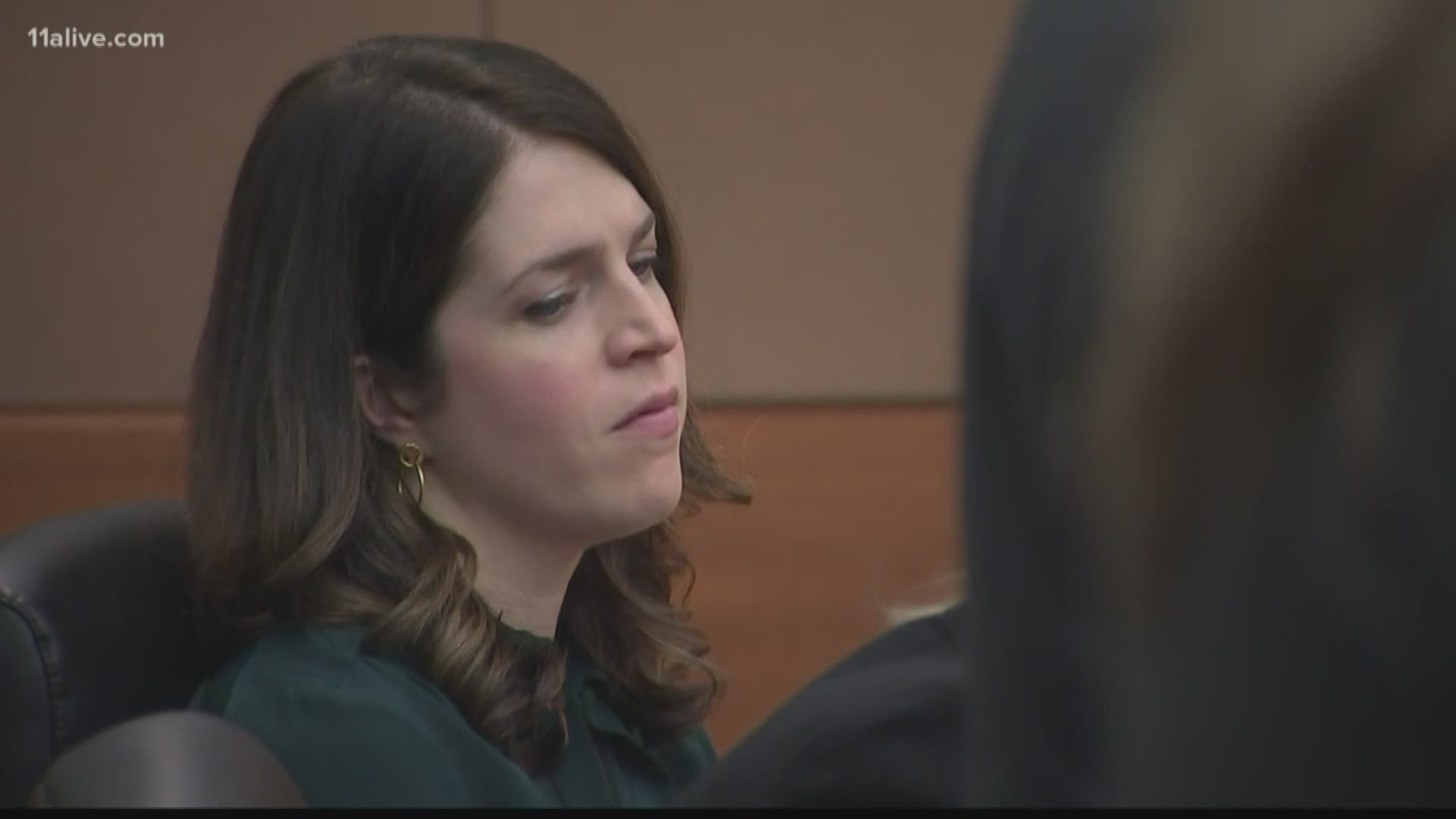Jenna Garland was found guilty of obstruction for allegedly telling city workers to delay communications and purposely release confusing information.