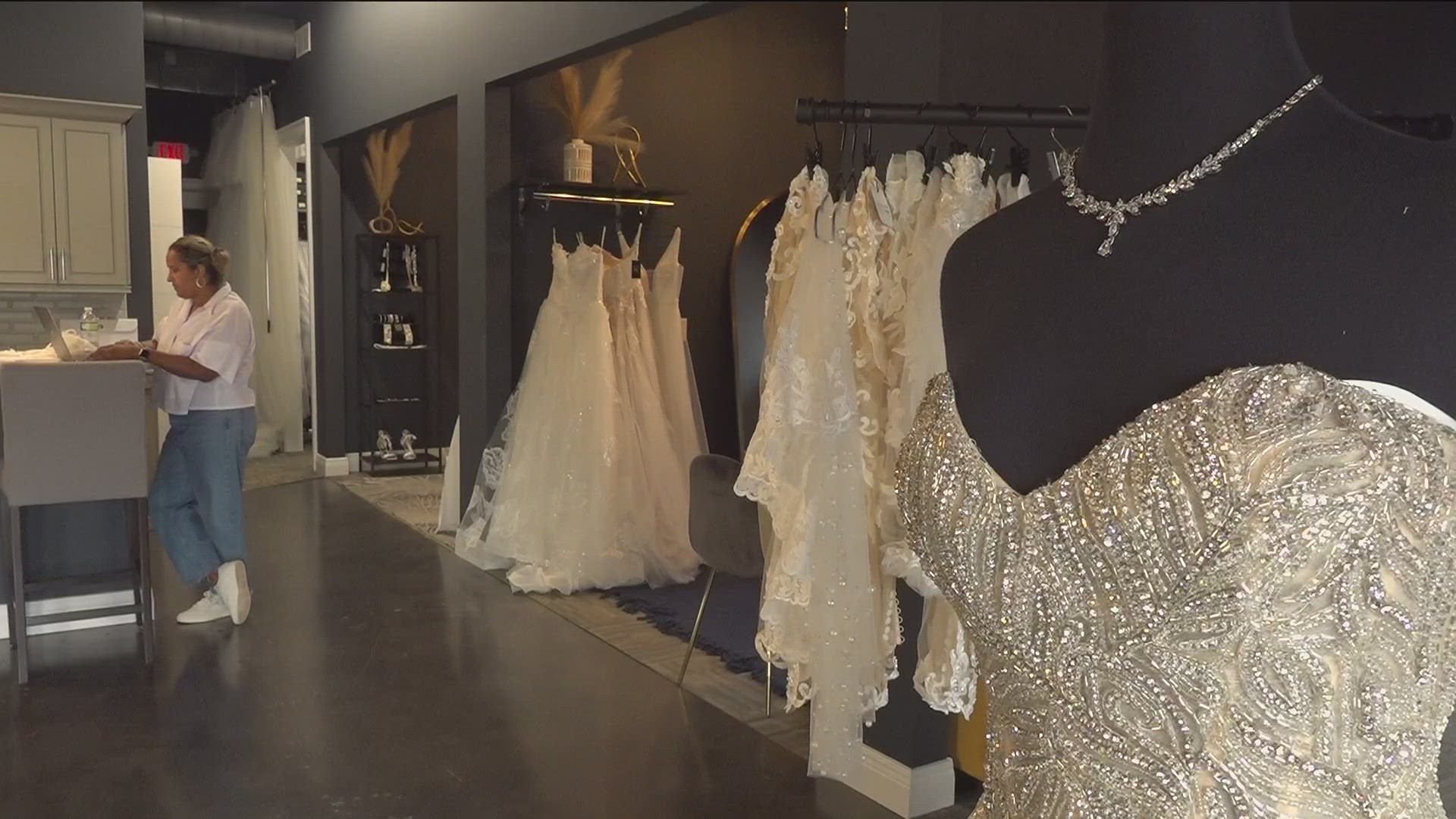 The owner of a bridal boutique is helping out Atlanta area brides who found themselves without dresses for their big day.