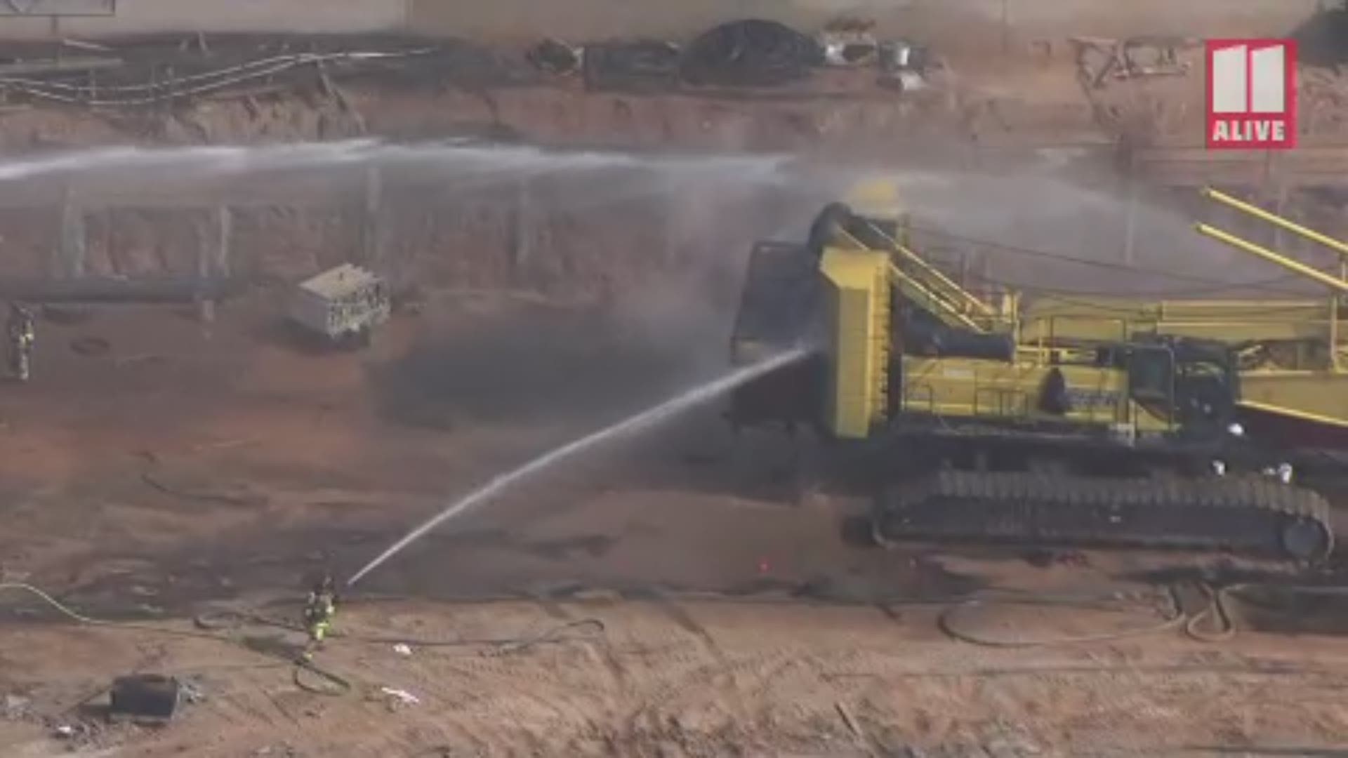 A crane collapsed in Alpharetta due to a fire and collapsed near Gwinnett Tech College. No one was hurt.