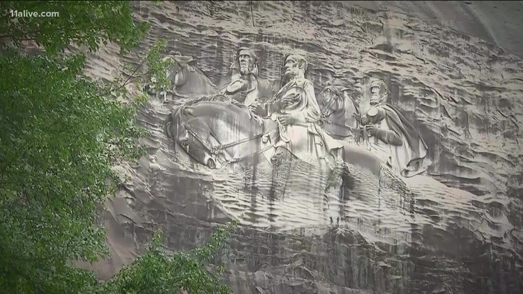 Board votes to get rid of mountainside carving of Confederate leaders from the logo