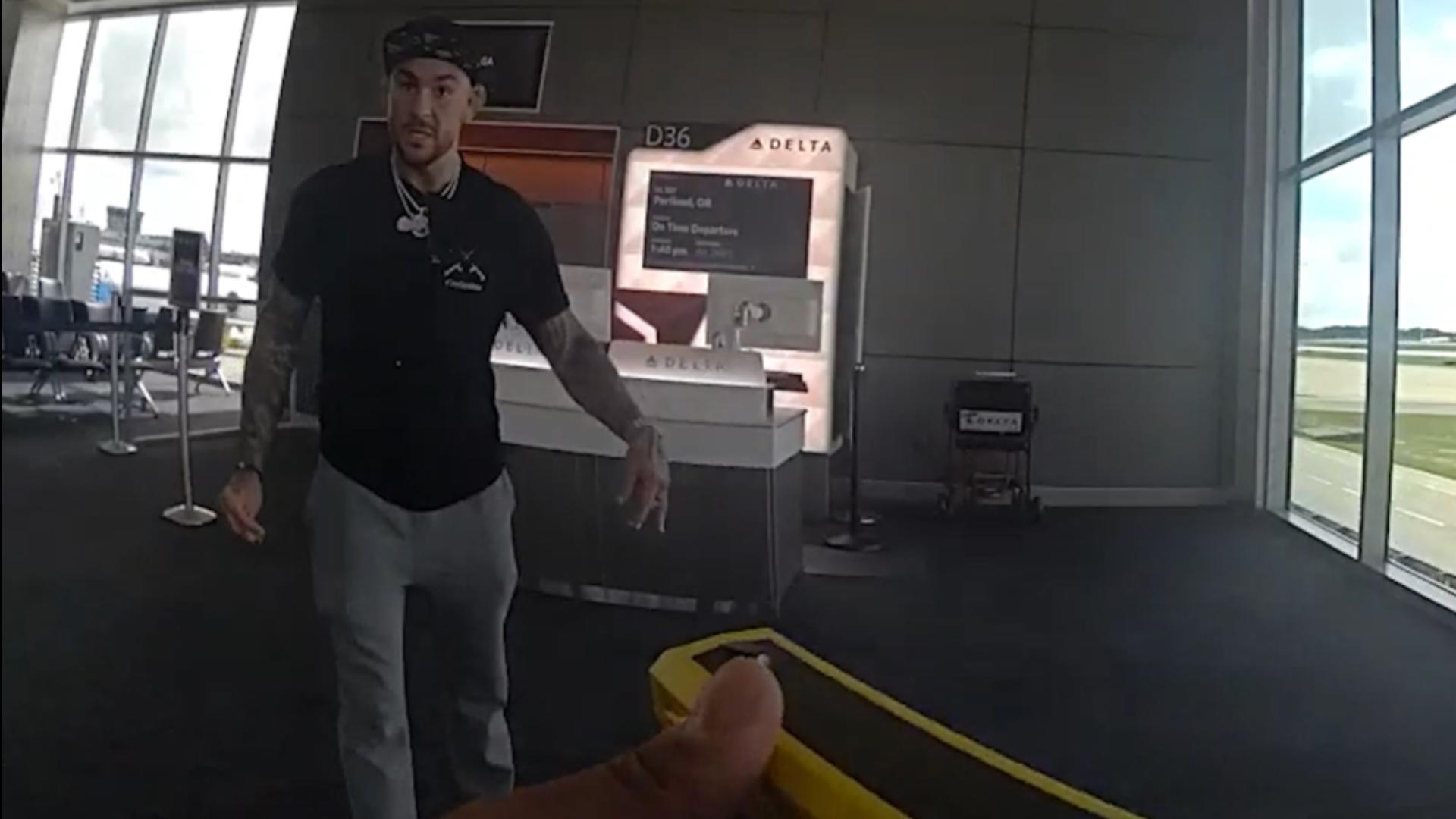 Video Shows Dustin Poirier Trying To Fight Cop At Atlanta Airport video-shows-dustin-poirier-trying-to-fight-cop-at-atlanta-airport
