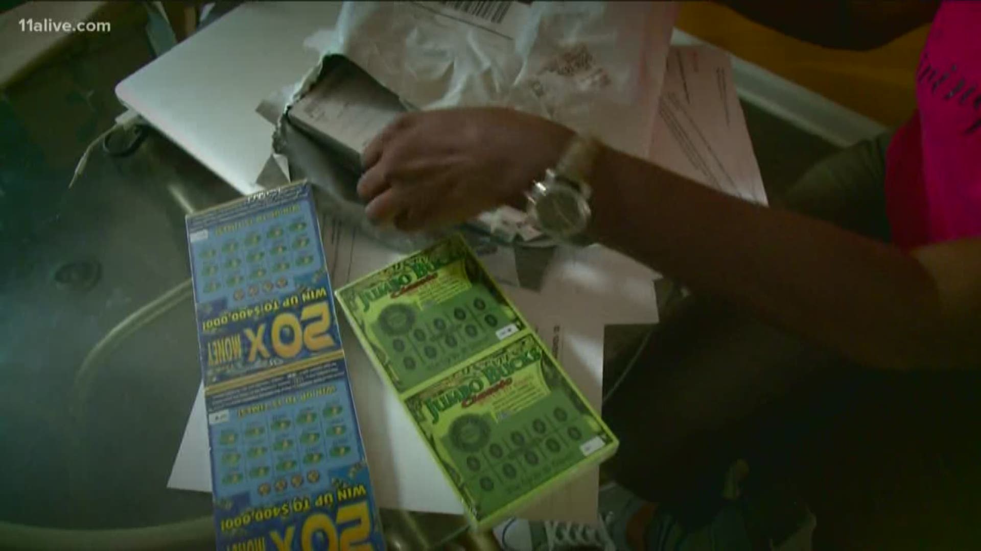 The Marietta woman wants the Georgia Lottery to fix the situation.